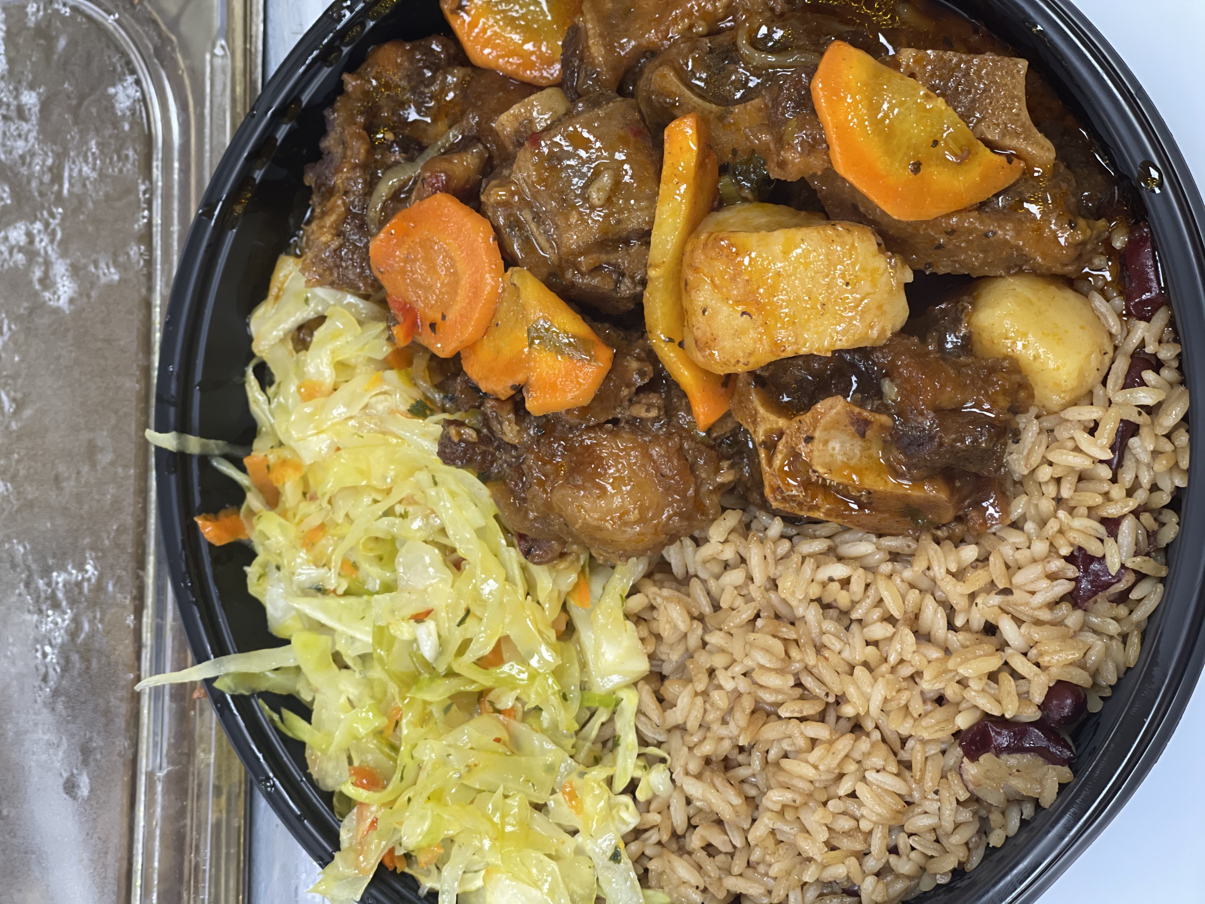 Order Jenny's Oxtail Stew food online from Taste of the Caribbean store, Capitol Heights on bringmethat.com
