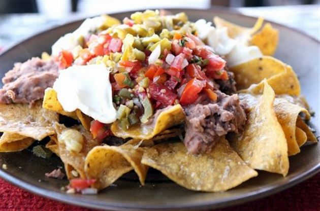 Order Nachos Supreme food online from Don Beto's Tacos store, Raleigh on bringmethat.com
