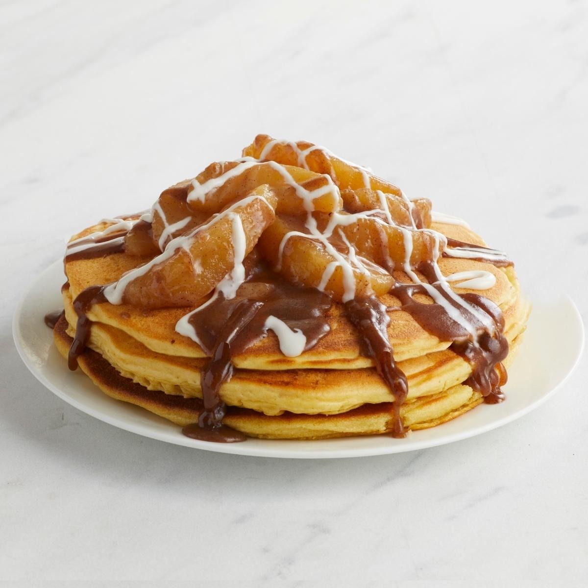 Order Cinnamon Apple Swirl Pancakes food online from Country Kitchen Restaurant store, Hibbing on bringmethat.com