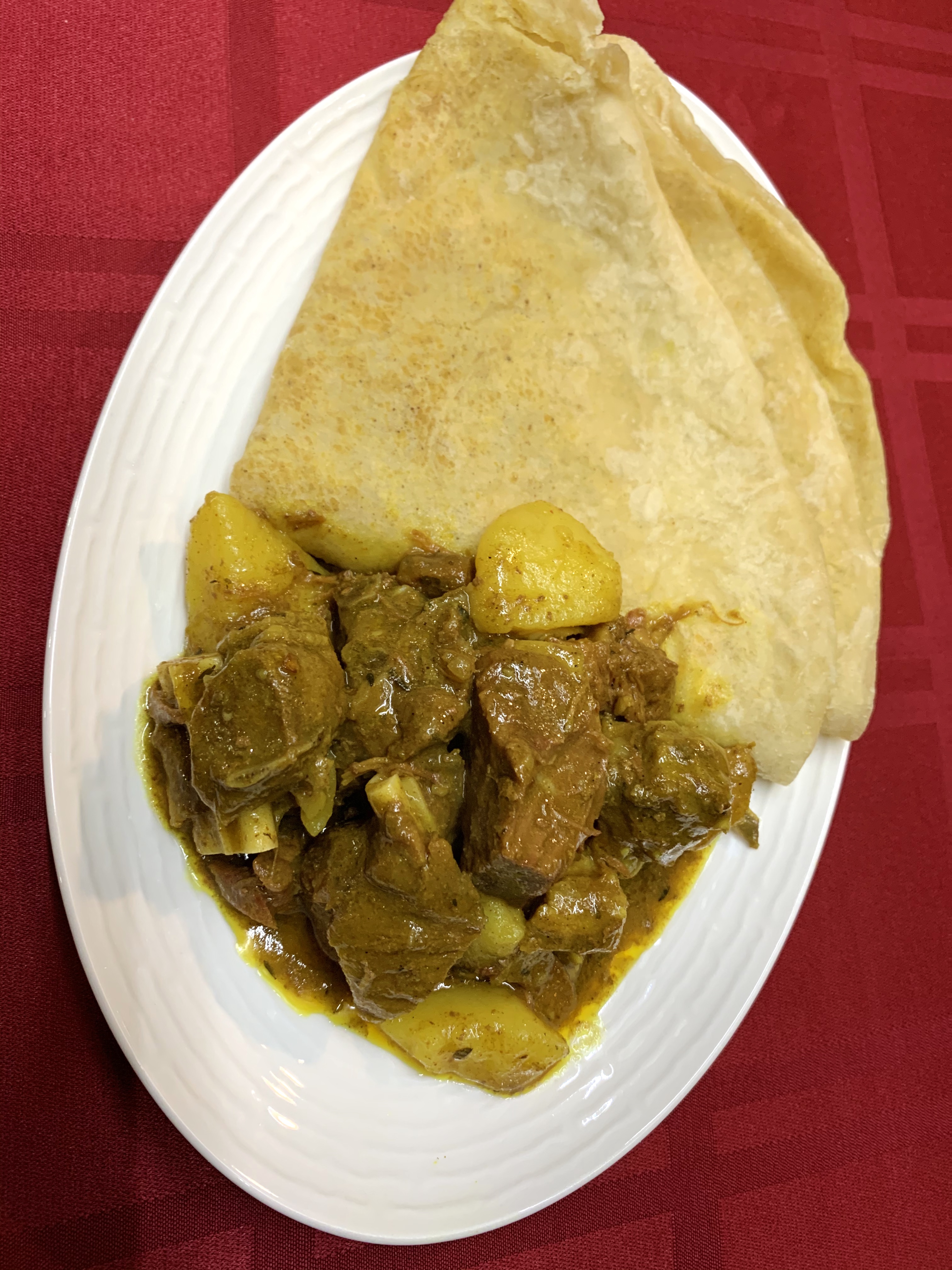 Order Curry Goat food online from Island Delight store, East Stroudsburg on bringmethat.com