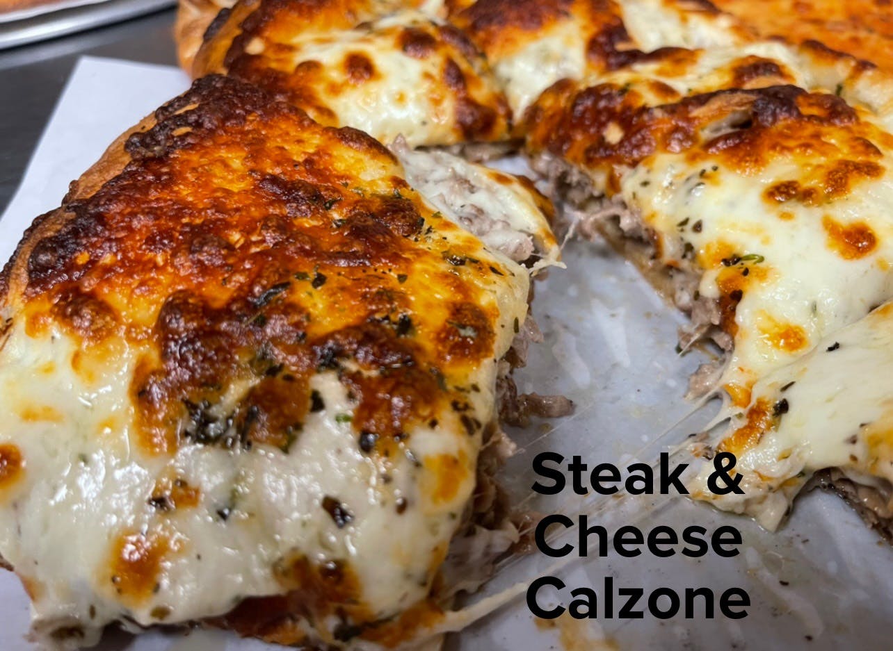 Order Steak & Cheese Calzone - 16" Calzone food online from Santoro's Of Peabody store, Peabody on bringmethat.com