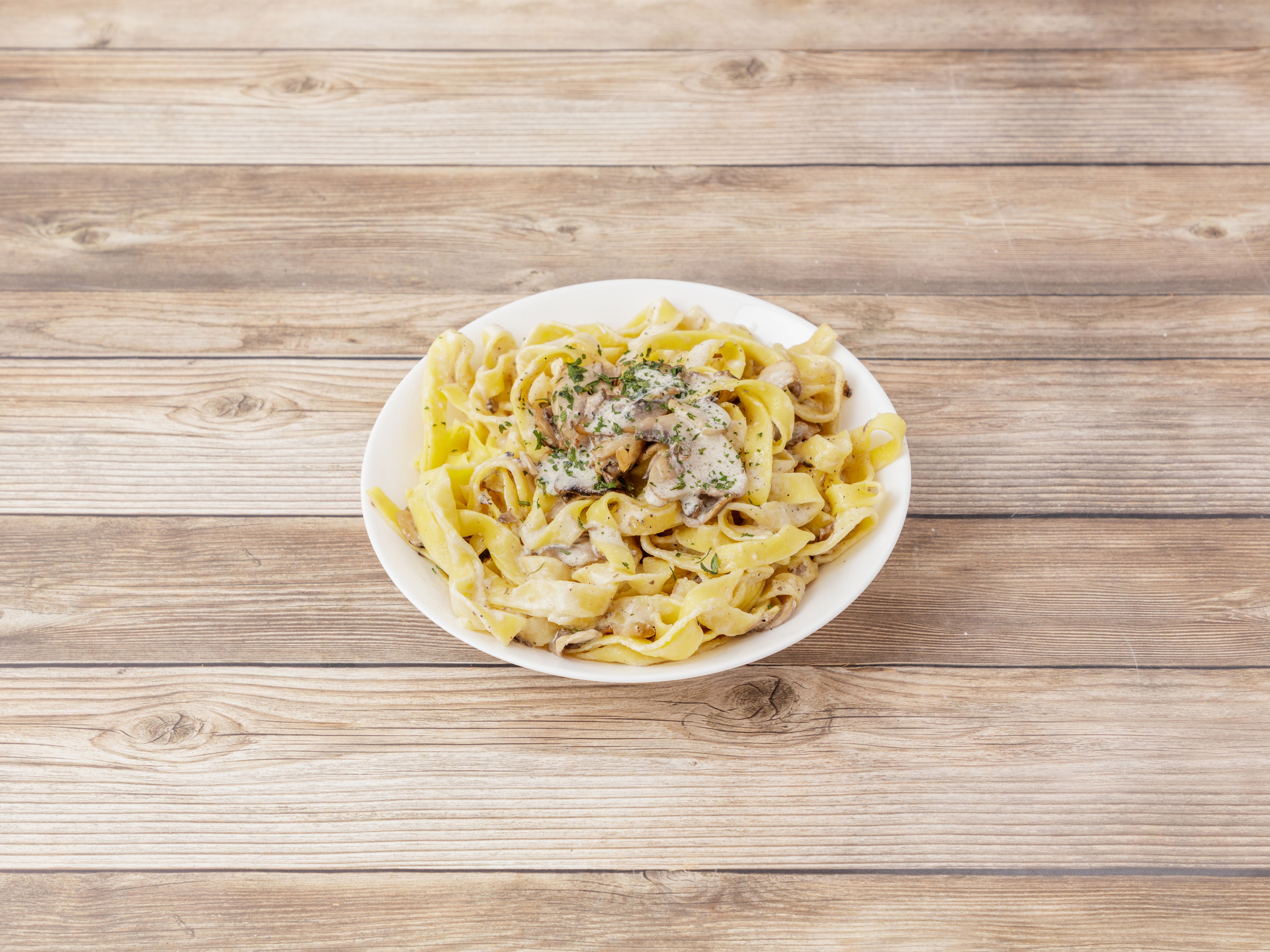 Order Tagliatelle ai Funghi food online from Pasta Beach store, Providence on bringmethat.com