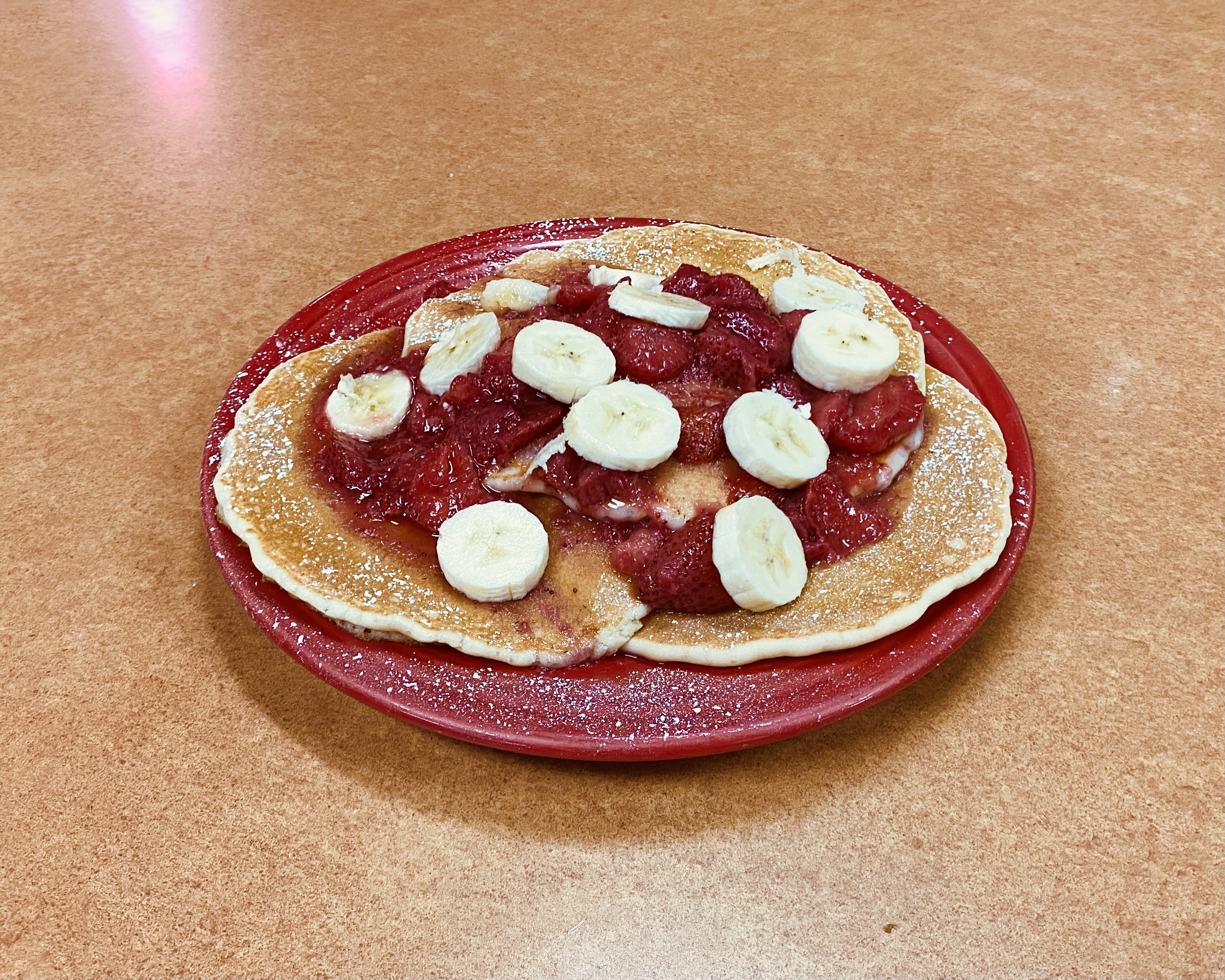 Order Strawberry Banana Pancakes food online from The Workz store, Lancaster on bringmethat.com