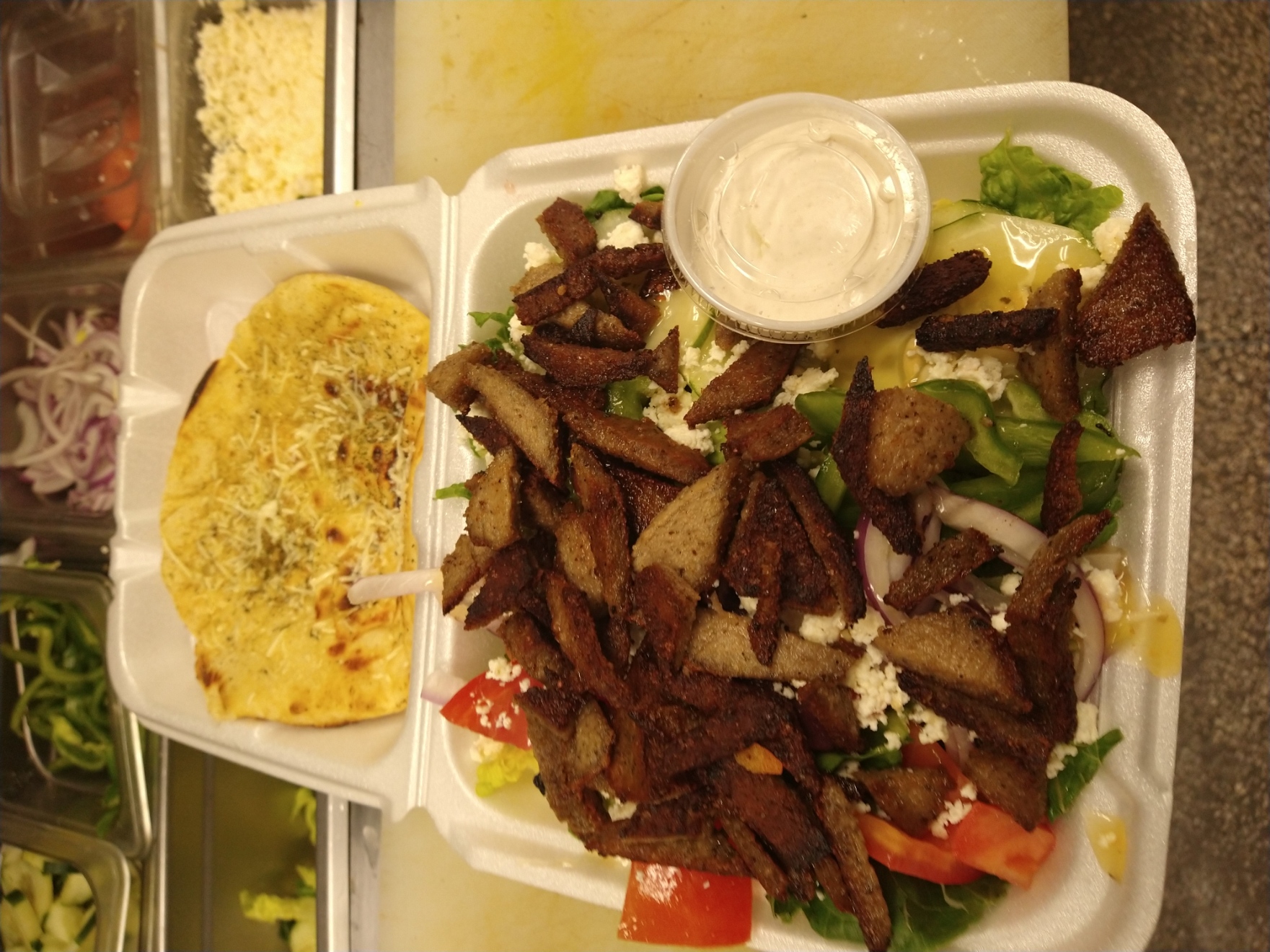 Order Caesar Salad with Gyro food online from Rosemary Grill store, Gibsonton on bringmethat.com