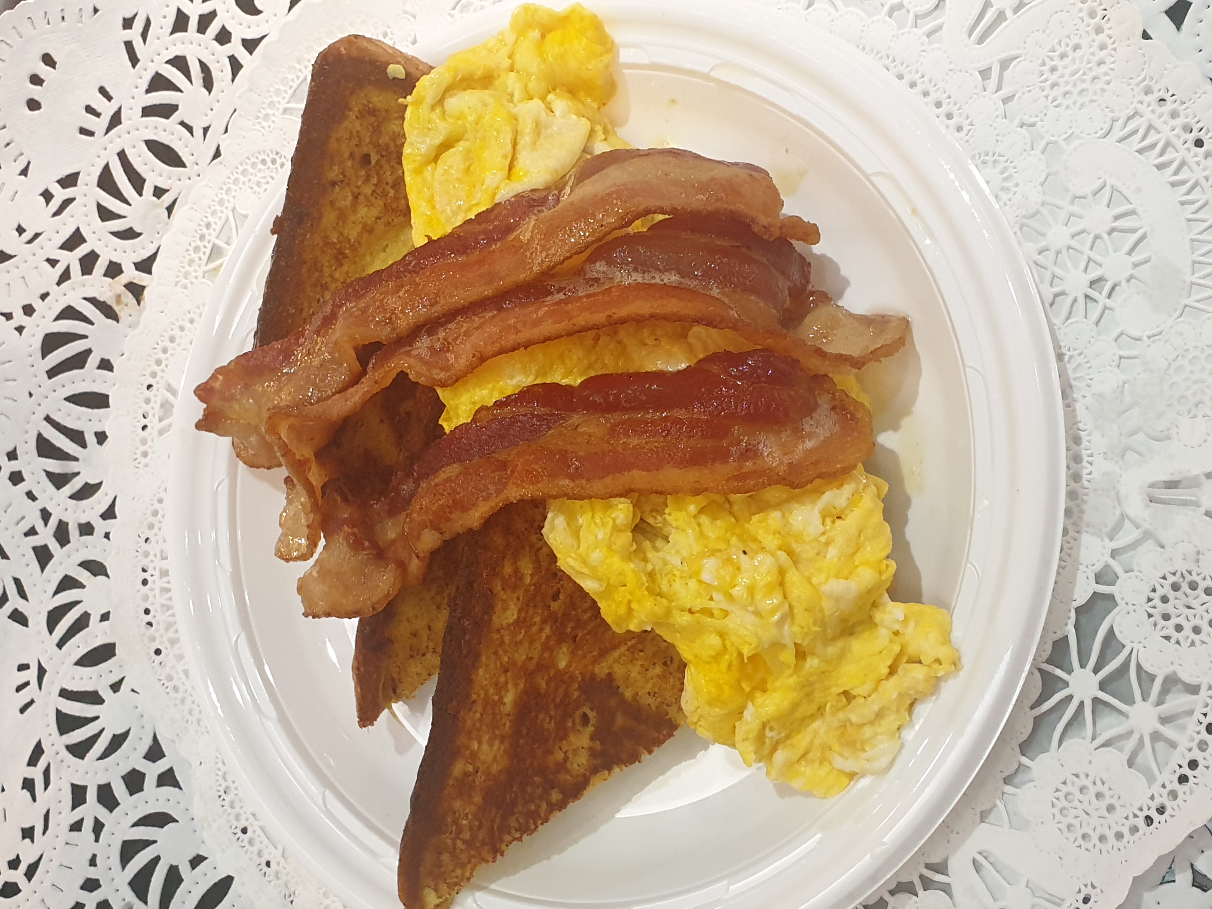 Order 13B-French Toast with Scrambled Eggs & Bacon food online from Taz Cafe store, New York on bringmethat.com
