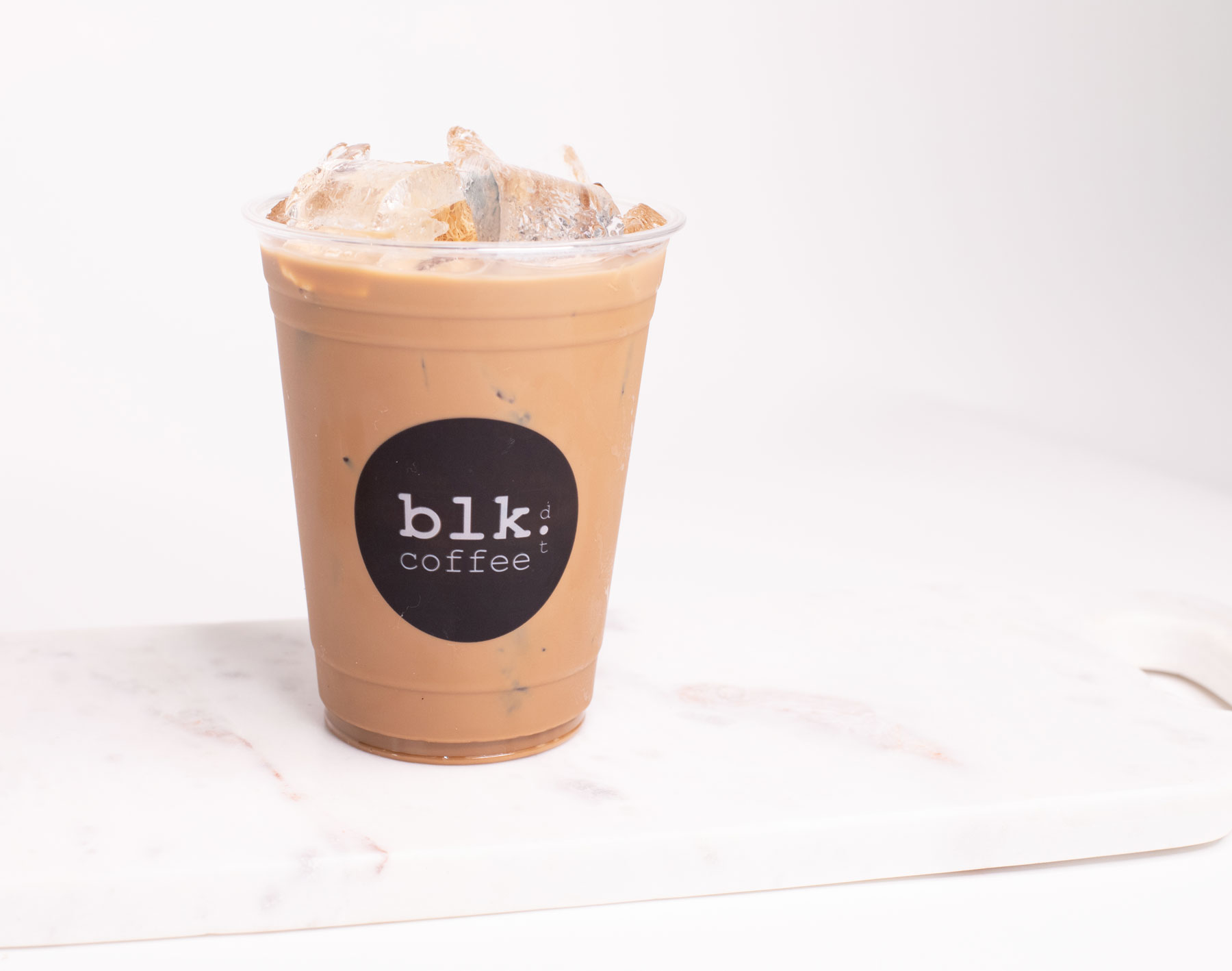 Order Iced LVTM Coffee food online from Blk Dot Coffee store, Irvine on bringmethat.com