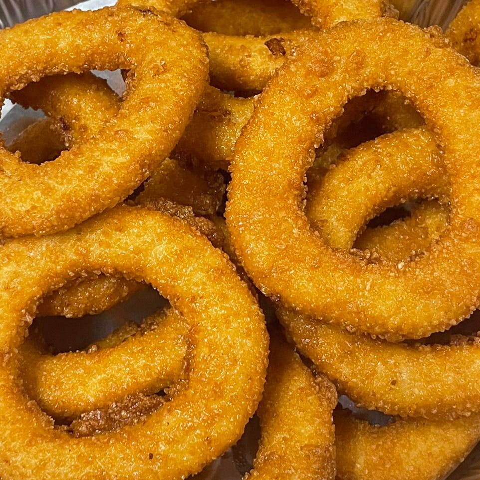Order Onion Rings - Appetizer food online from Davila's Pizza & Restaurant store, Hackettstown on bringmethat.com