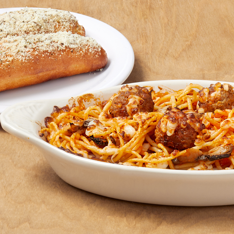 Order Spaghetti Deluxe food online from Pizza Inn store, Dallas on bringmethat.com
