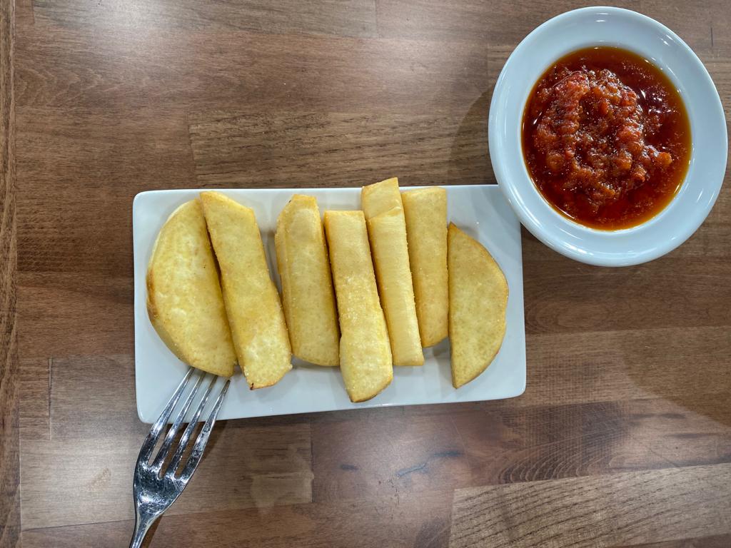 Order Fried Yam (Dundun) + Stew food online from Fusion Vibes Kitchen + Bar store, Richardson on bringmethat.com