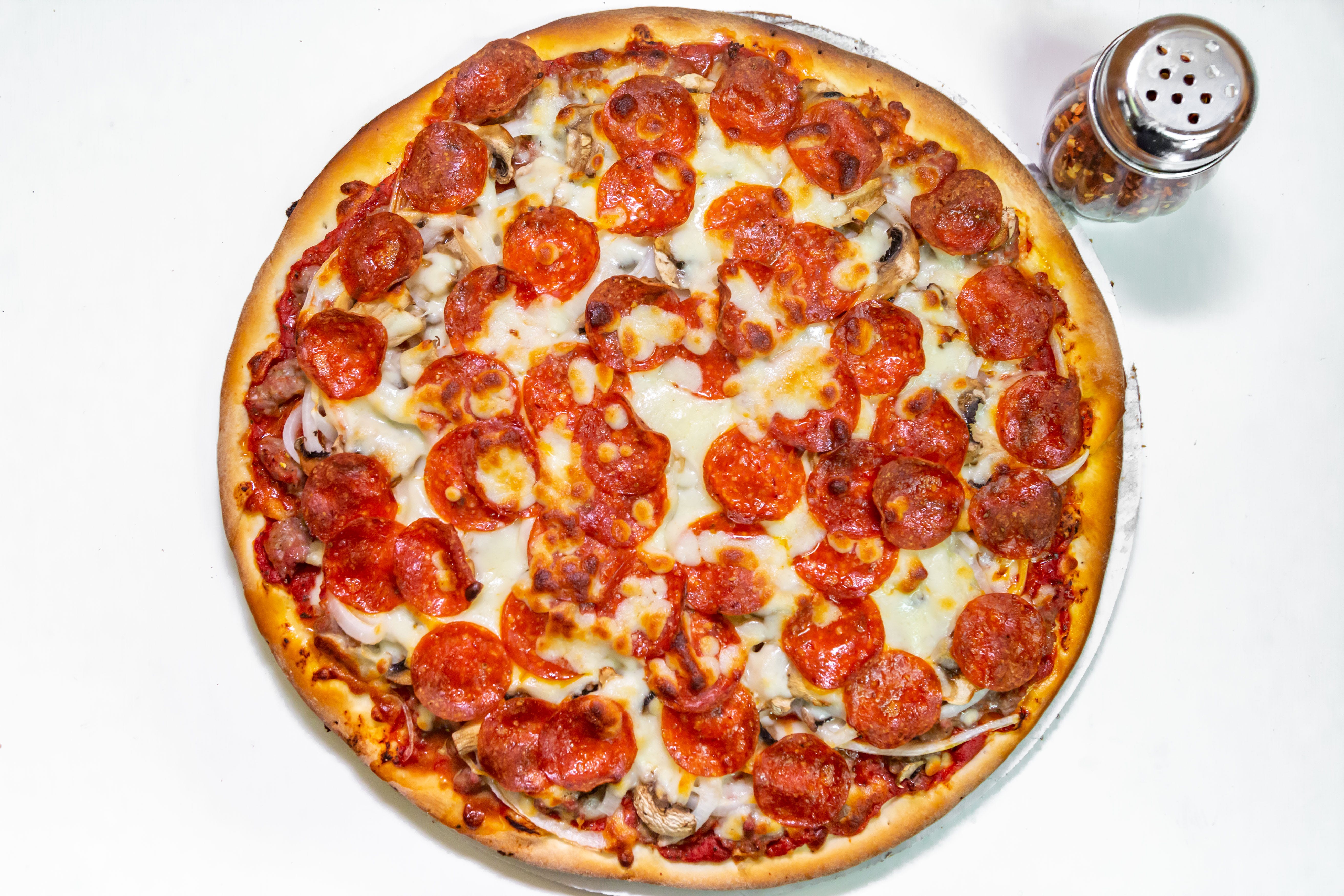 Order Supreme Pizza - Small 12" (Serves 2-3) food online from Benny's Pizza store, Chicago on bringmethat.com