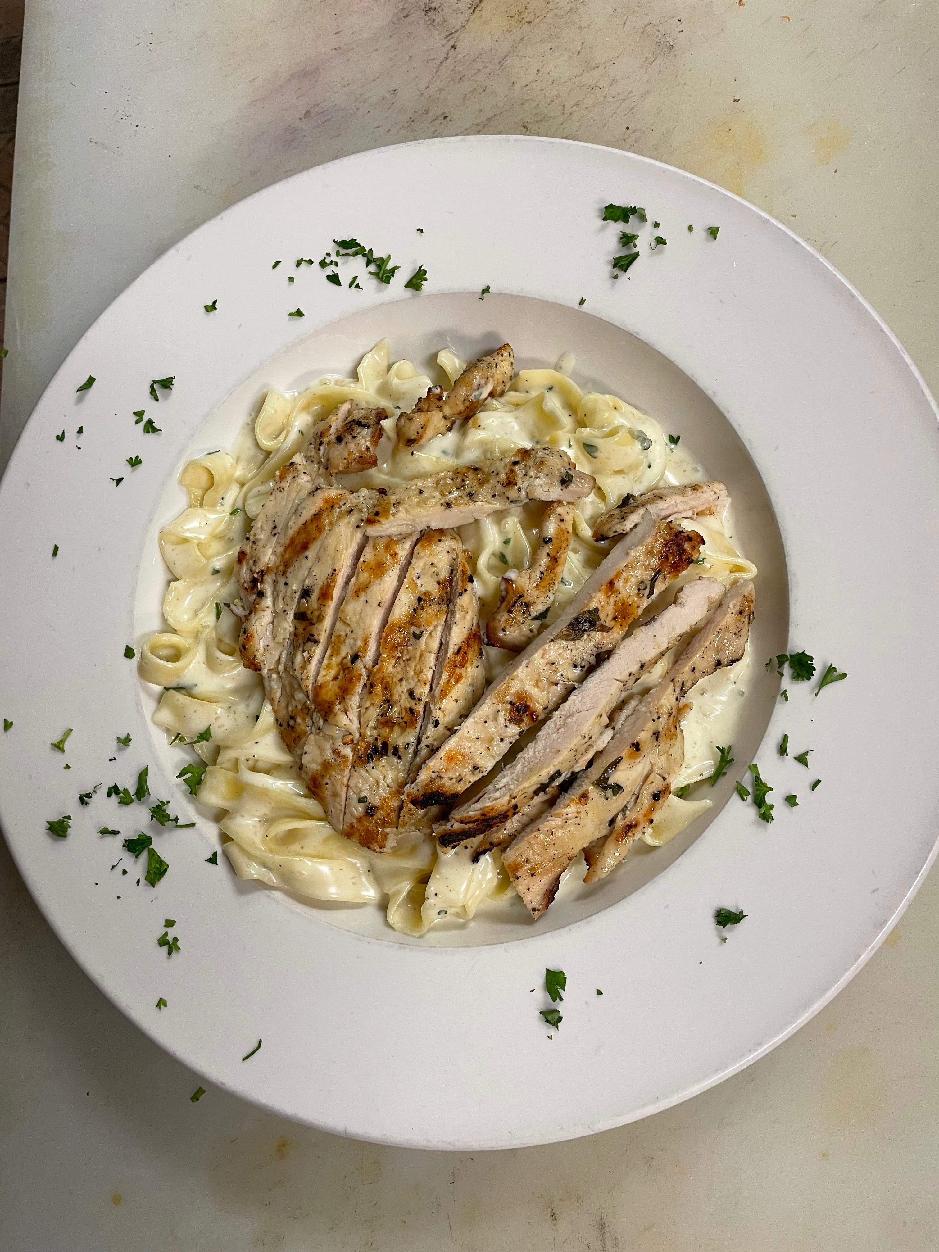 Order Fettuccine Alfredo with Grilled Chicken - Entree food online from NY Joe's Italian Restaurant store, Alice on bringmethat.com