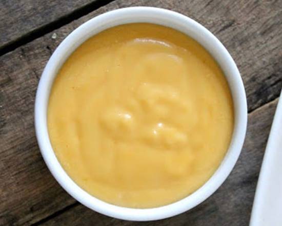 Order Cheese Sauce | 4 oz cup food online from Mr. Submarine store, Downers Grove on bringmethat.com