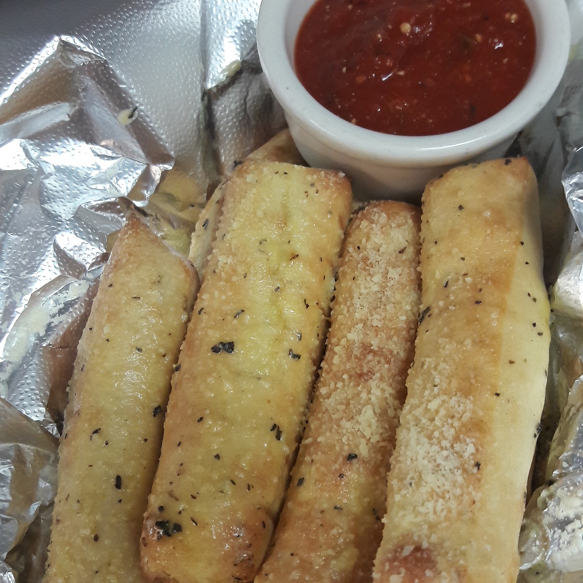 Order Garlic Breadsticks food online from Papa G's Pizza, Pasta Cafe store, Wildomar on bringmethat.com