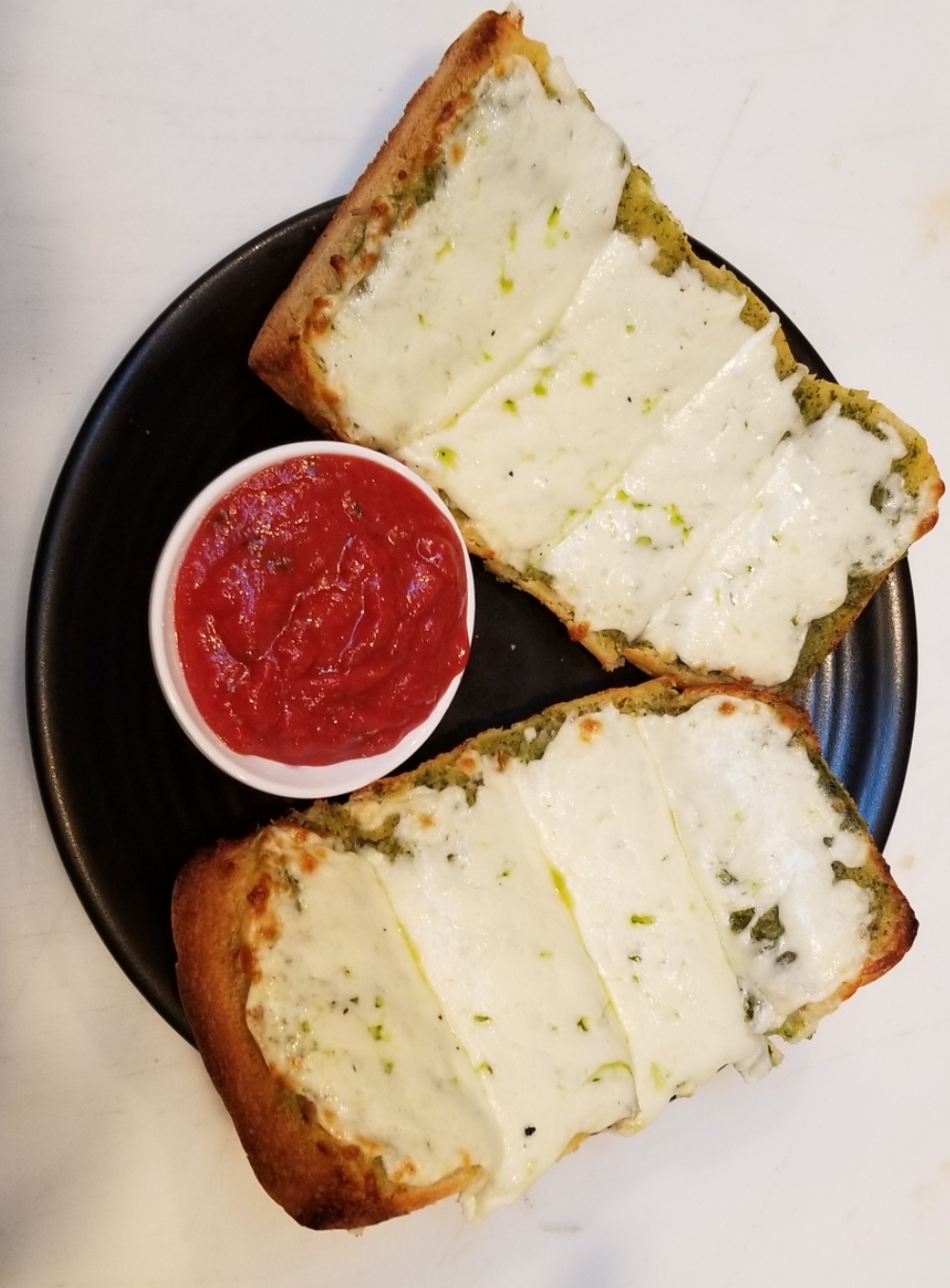 Order Garlic Bread with Cheese and Pesto food online from Hayes Pizza store, San Francisco on bringmethat.com