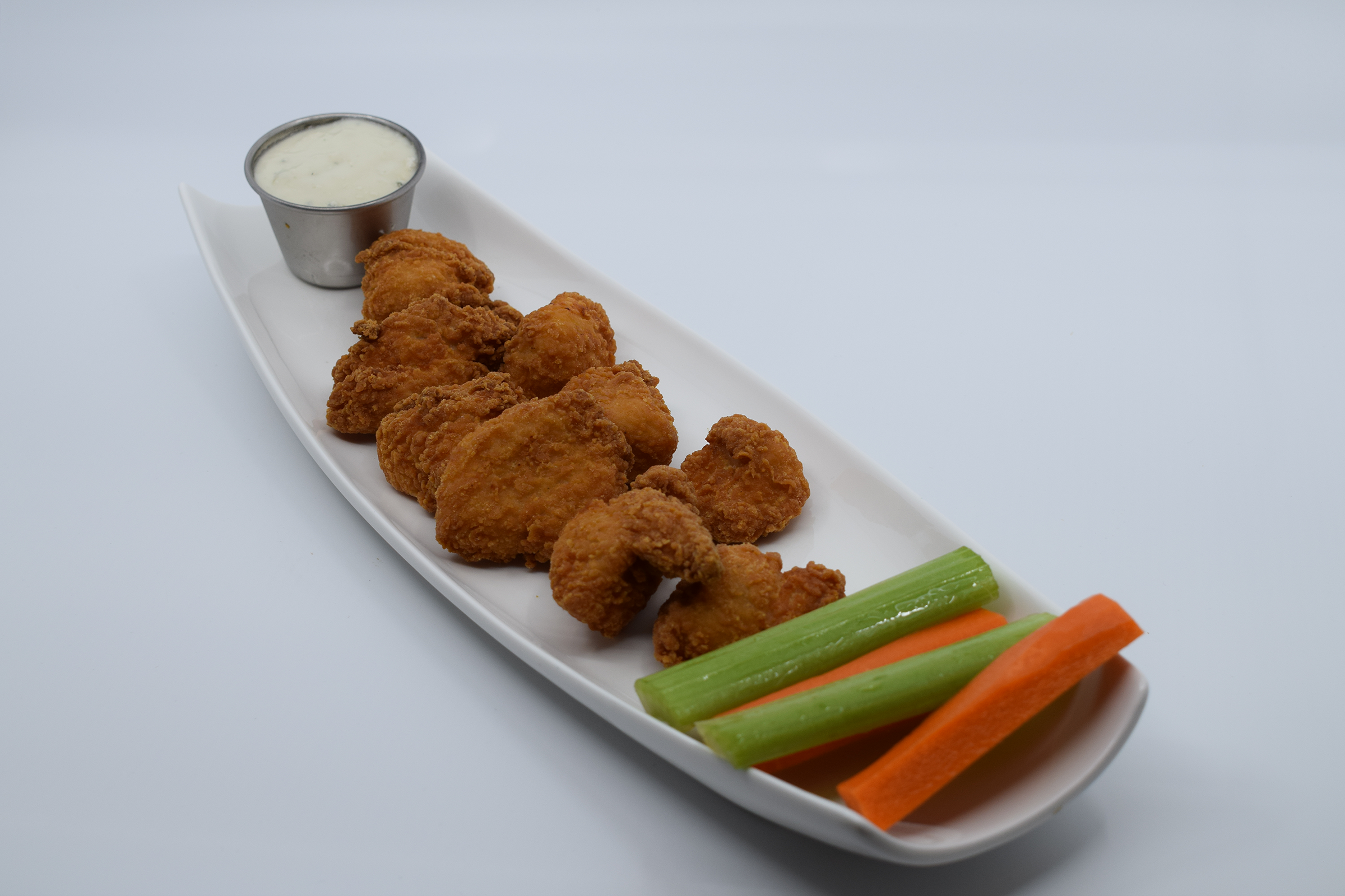Order Boneless Plain Chicken Wings food online from Mad House Comedy Club store, San Diego on bringmethat.com