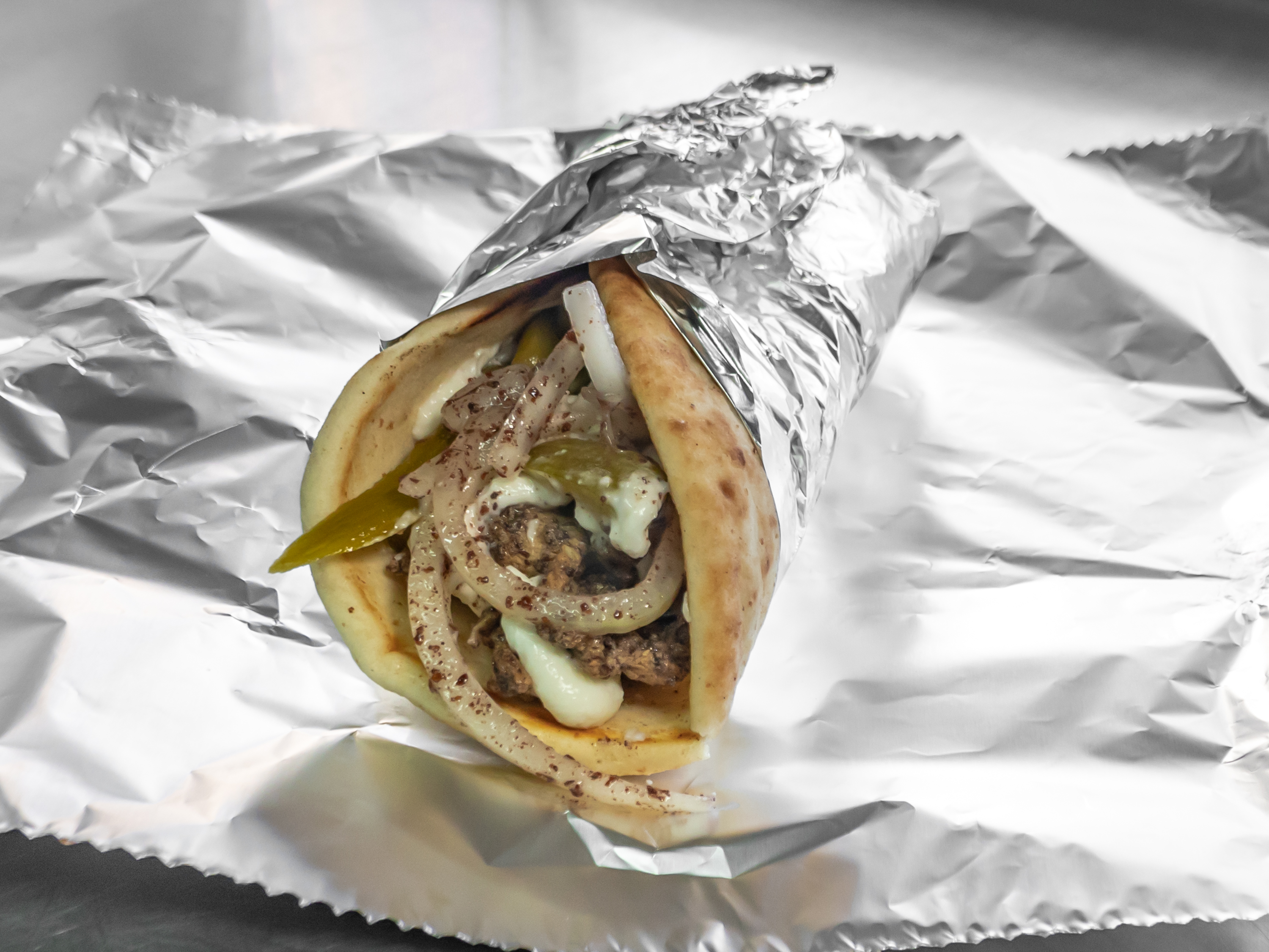 Order East West Wrap food online from Pita On The Plaza store, Bethesda on bringmethat.com