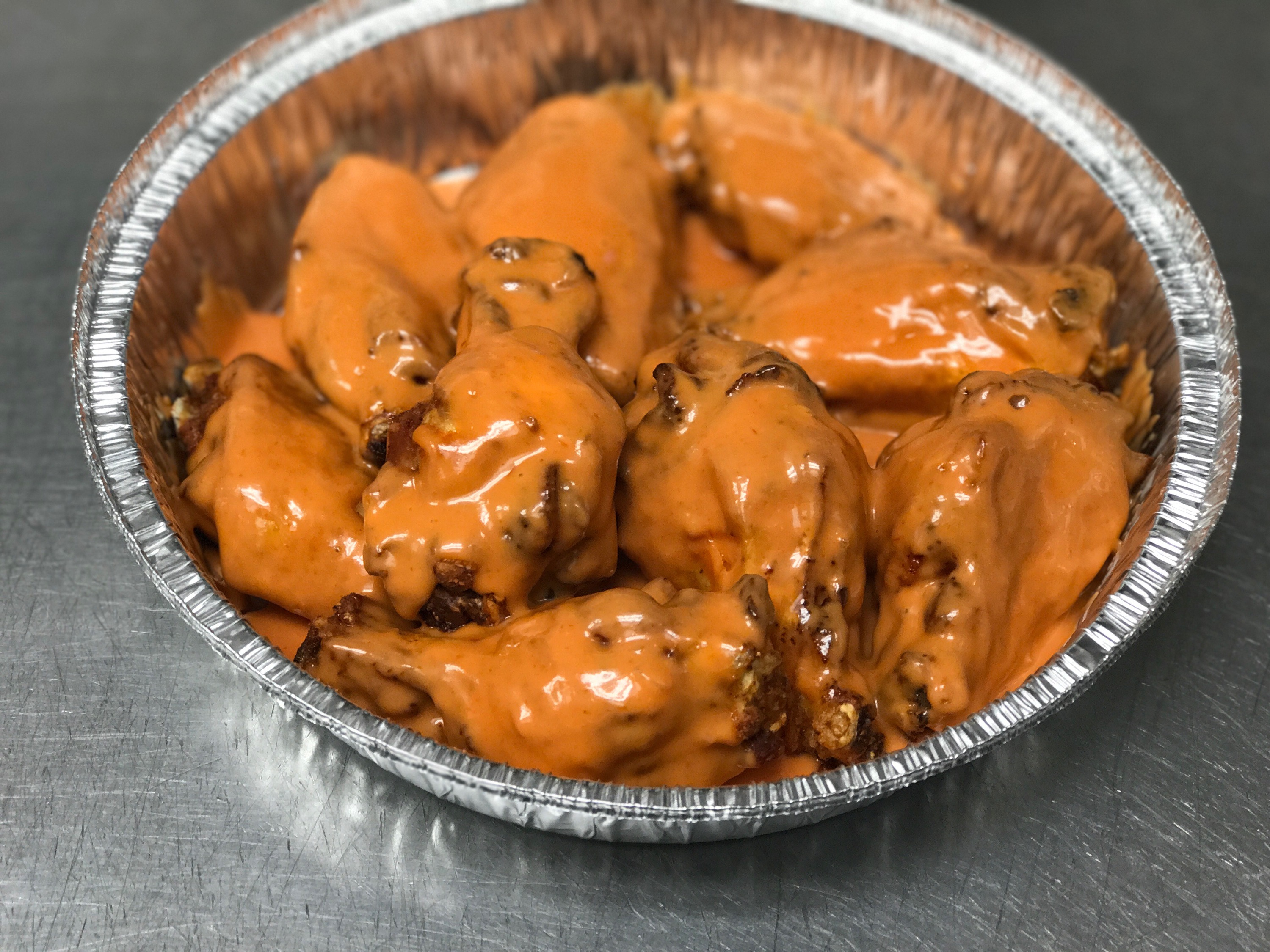 Order Traditional Unbreaded Buffalo Wings food online from Stella Pizzeria store, Philadelphia on bringmethat.com