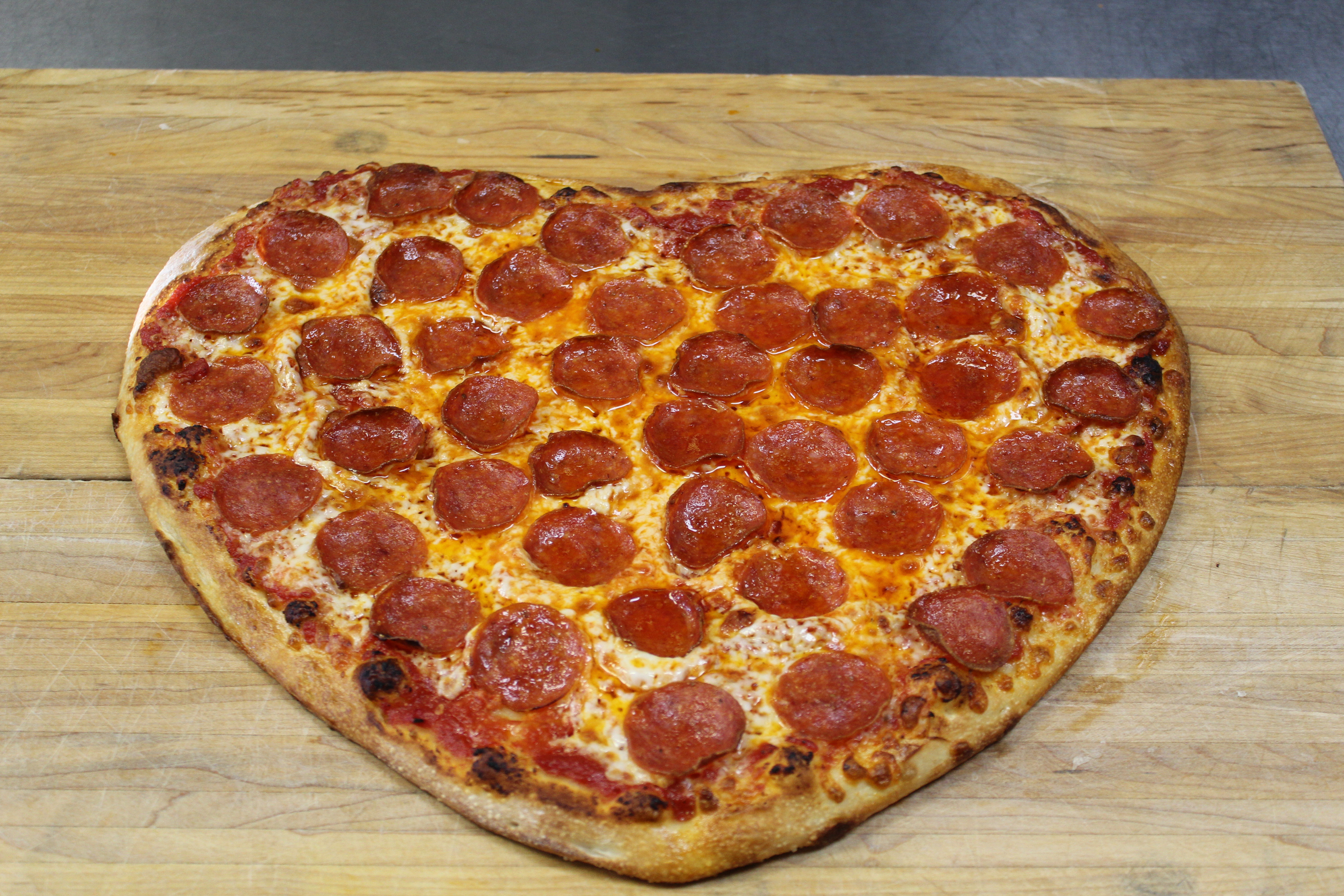 Order Heart Shaped Pizza food online from Mama Mary Pizza store, Holland on bringmethat.com