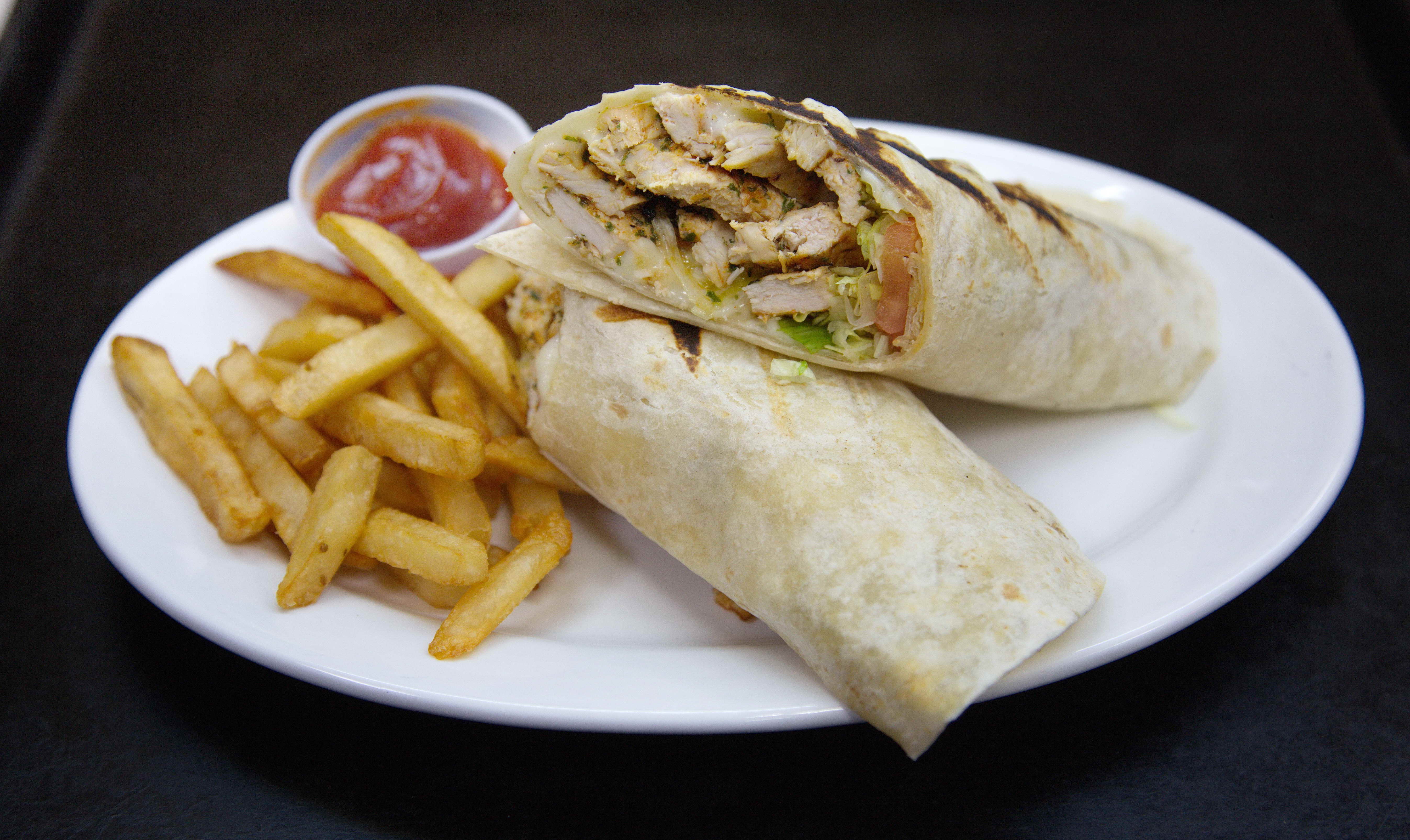 Order Grilled Chicken and Mozzarella Wrap food online from Famous Calabria store, New York on bringmethat.com