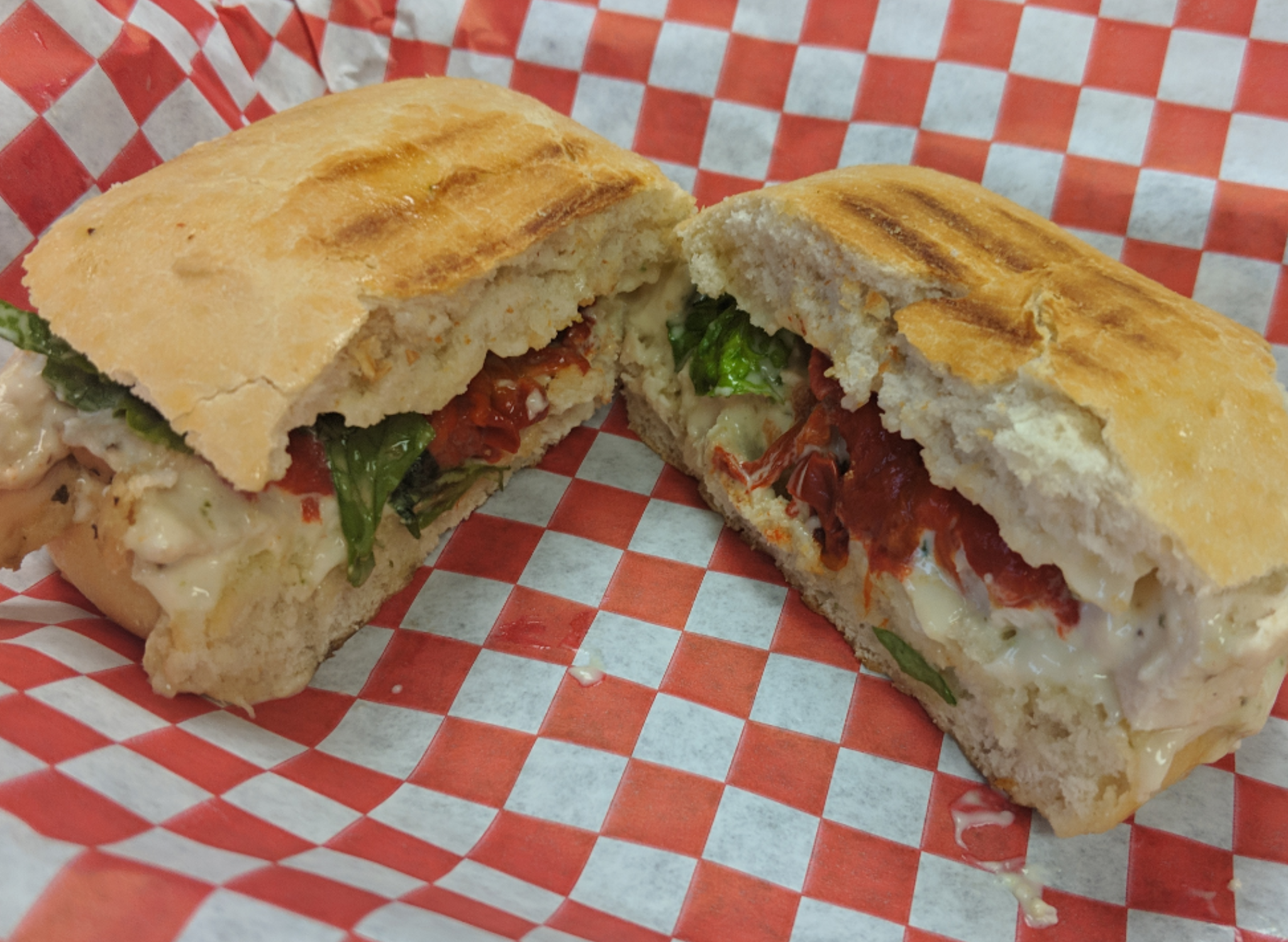 Order Chicken Florentine Panini food online from Marco Polo Cheesesteaks store, New Braunfels on bringmethat.com