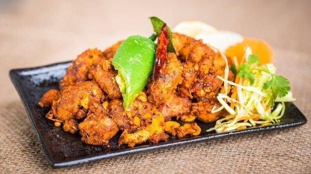 Order Karampodi Kodi (Chicken) food online from Bawarchi Biryanis store, Ashburn on bringmethat.com