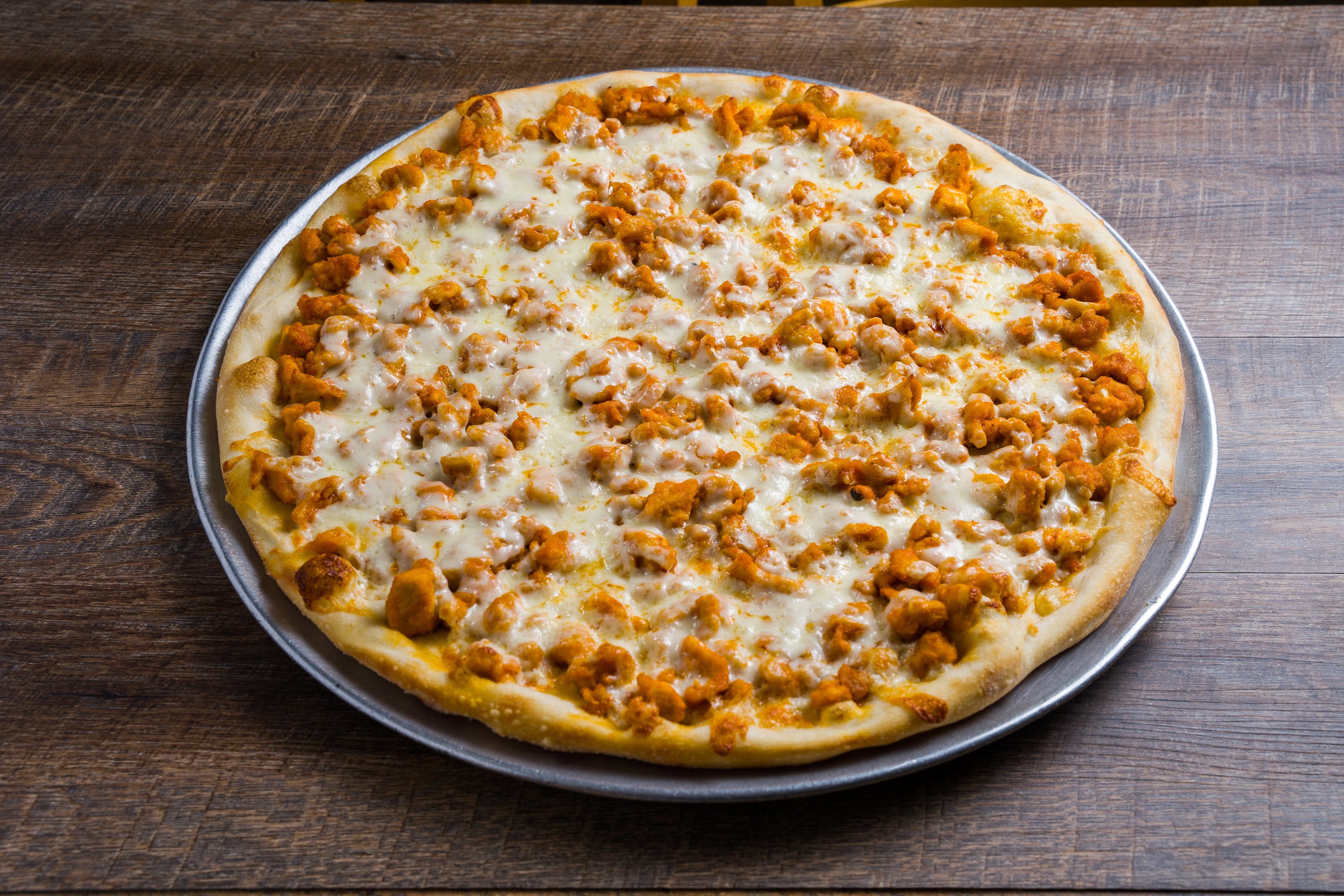Order Buffalo Chicken Pizza - Mini Personal food online from Regina Pizza store, Lynbrook on bringmethat.com