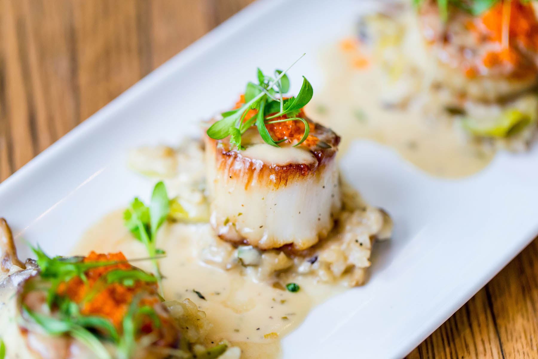 Order Seared Diver Scallops food online from Abouzy store, Houston on bringmethat.com