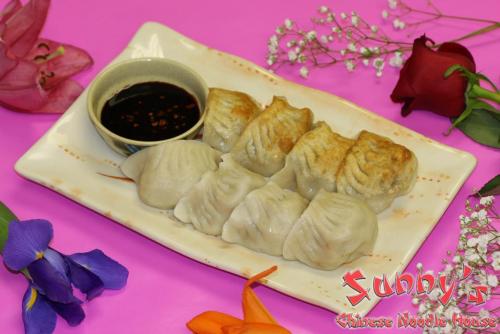 Order 12. Steamed Dumplings food online from Sunny's Chinese Noodle House store, Green Bay on bringmethat.com