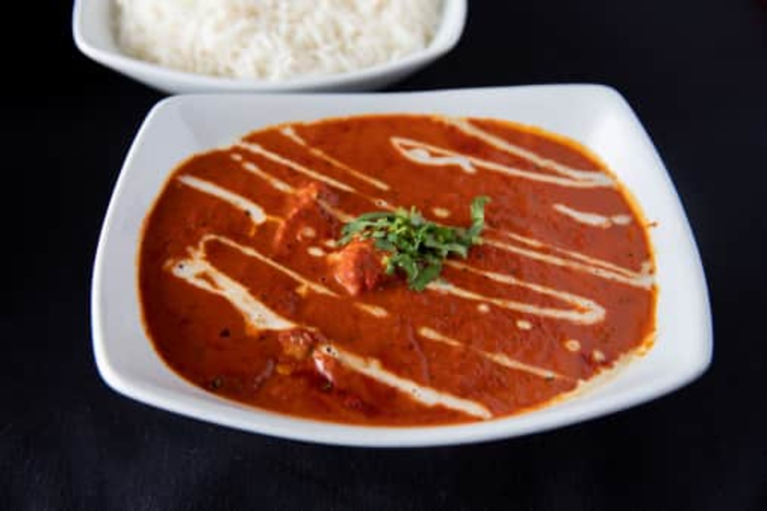 Order Butter Chicken food online from Holi Indian Grill store, Panama City on bringmethat.com