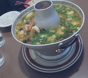 Order 64. Seafood in a Hot Pot food online from Lisu's Thai Taste | Roseville store, Roseville on bringmethat.com