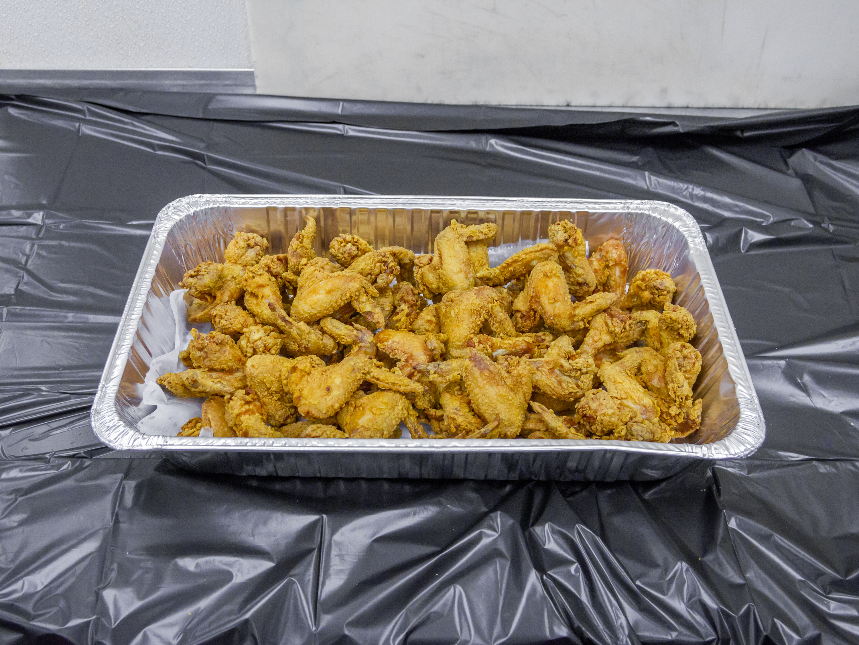 Order 50 Pieces Wing Dings Specials food online from Southfield Fish & Chicken store, Southfield on bringmethat.com