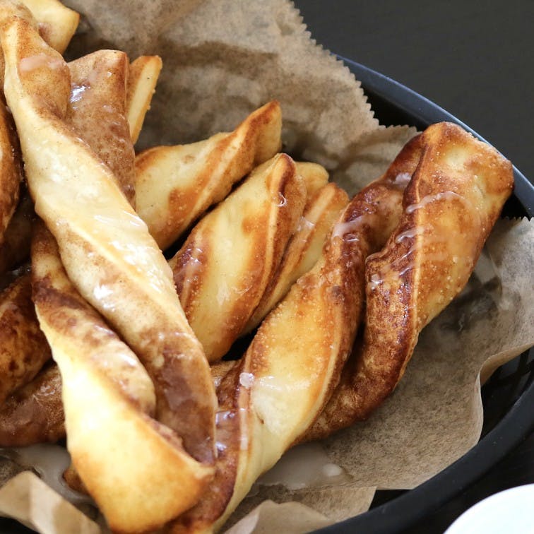 Order Cinnamon Twists - 3 Pieces food online from Round Table Pizza store, El Cajon on bringmethat.com
