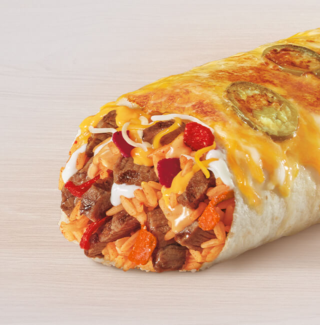 Order Spicy Double Steak Grilled Cheese Burrito food online from Taco Bell store, Compton on bringmethat.com