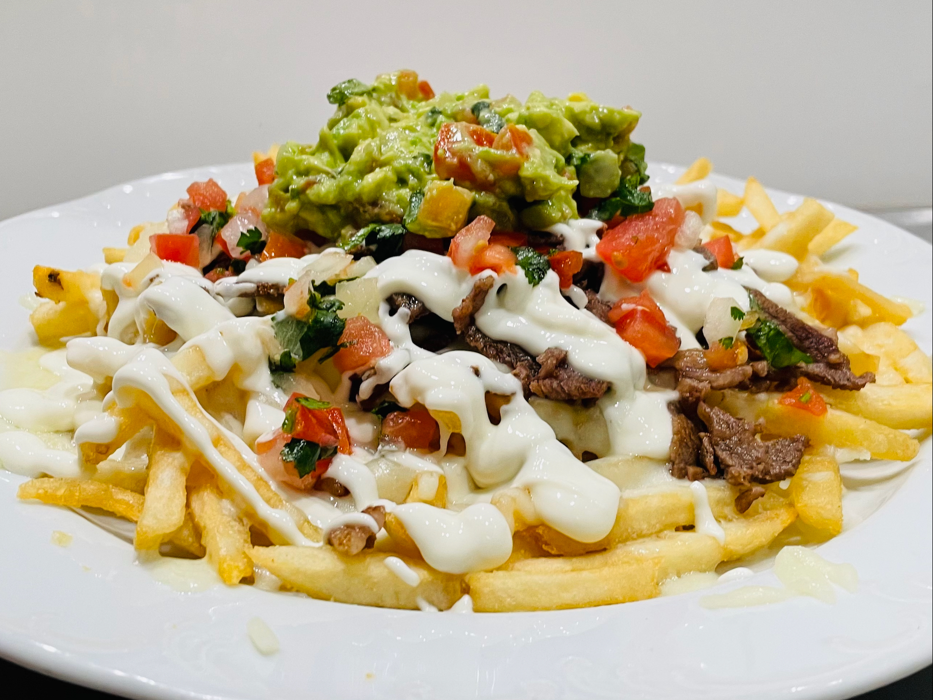 Order ASADA FRIES food online from Huarache Xpress store, Simi Valley on bringmethat.com
