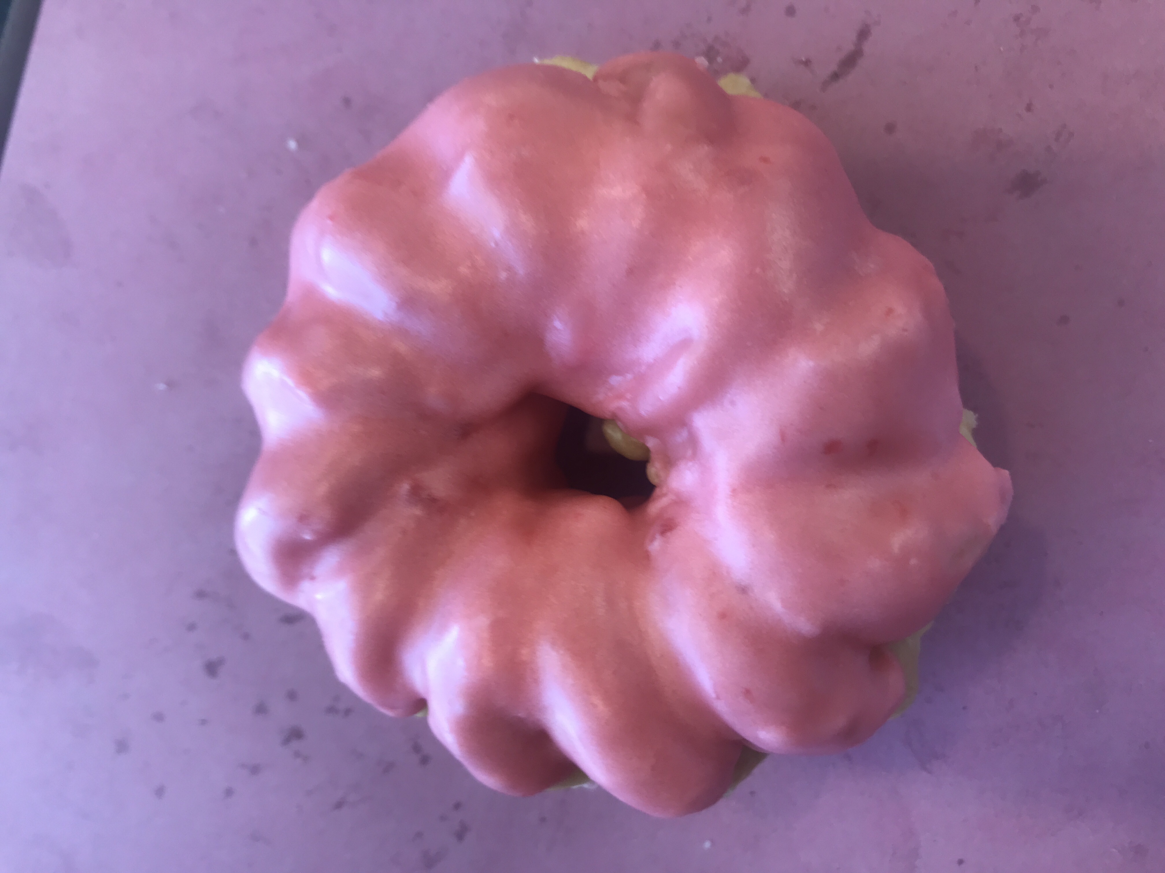 Order Pink French Cruller food online from Angel Panama Lane Donuts store, Bakersfield on bringmethat.com