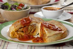 Order Meatball Calzone - Calzone food online from Two Guys Pizzeria store, Houston on bringmethat.com