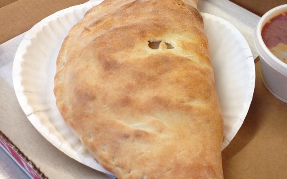Order Buffalo Chicken Calzone - Calzone food online from Hometown Pizza store, Litchfield on bringmethat.com