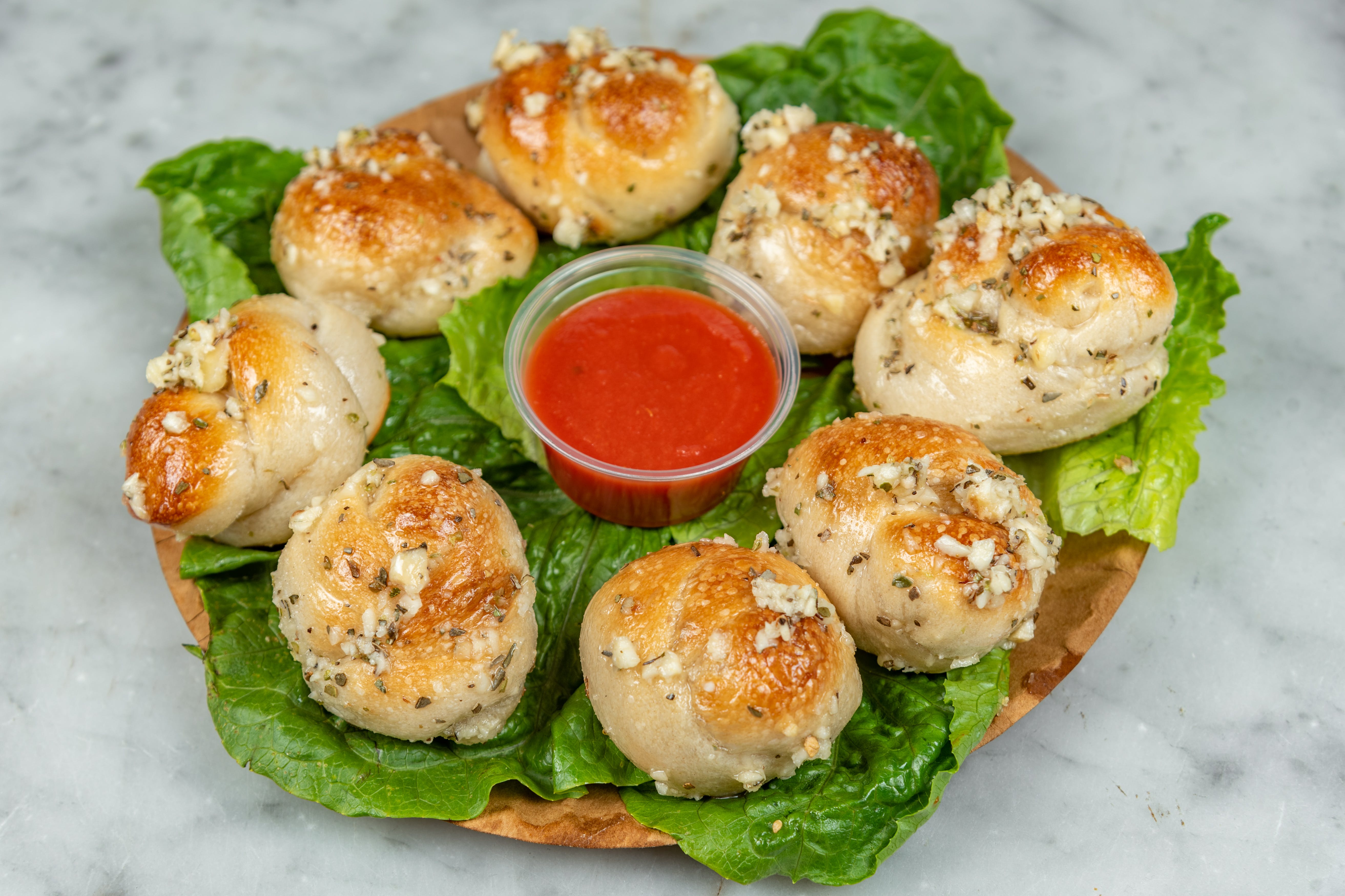 Order Garlic Knots - 5 Pieces food online from Rams Pizza Plus store, Bronx on bringmethat.com