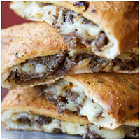 Order Philly Cheesesteak Stromboli food online from DoubleDave's Pizzaworks - San Angelo store, San Angelo on bringmethat.com