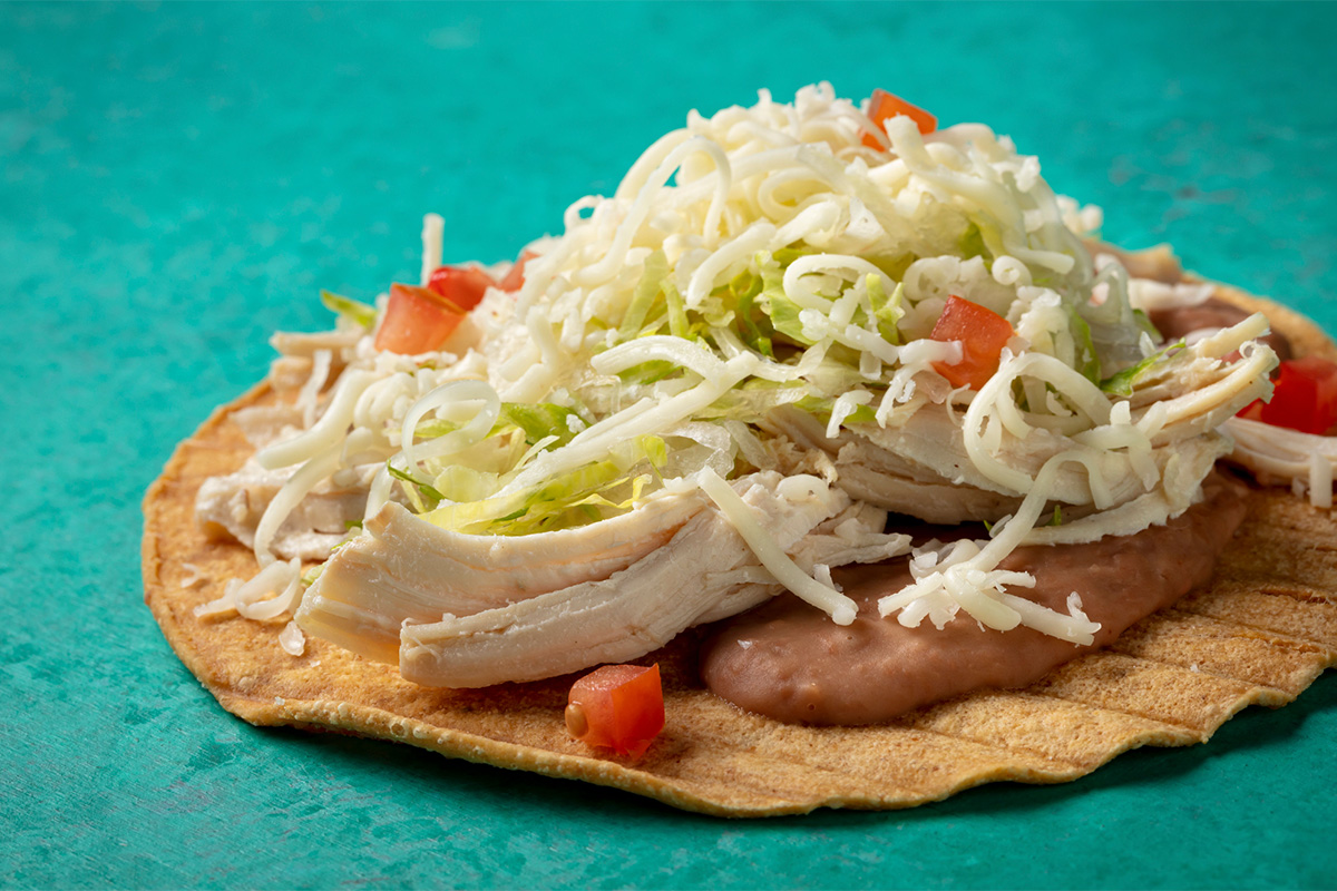 Order Tostada food online from Miguel's Jr store, Norco on bringmethat.com