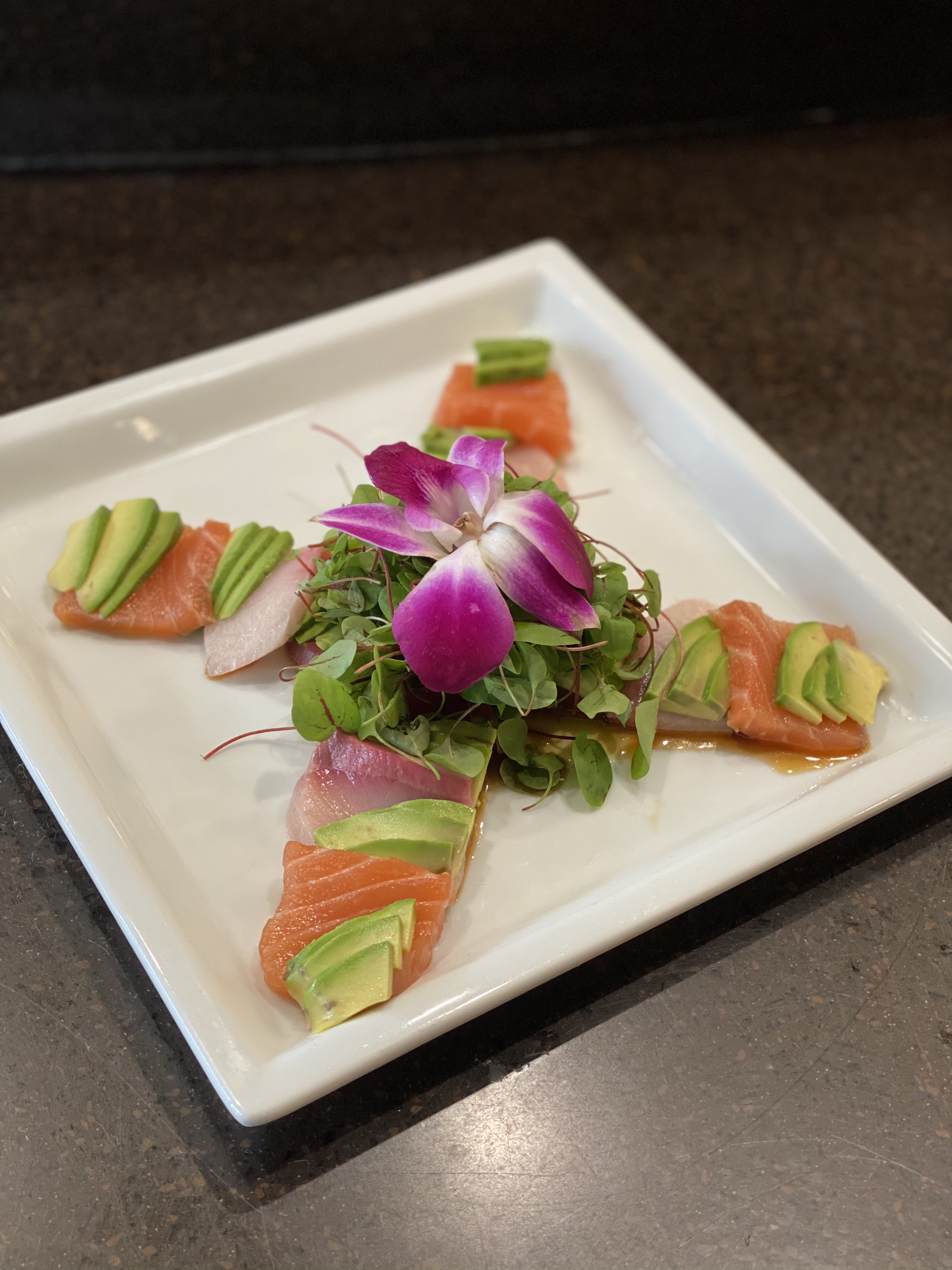 Order Rainbow Carpaccio food online from Kanpai Japanese Sushi Bar and Grill store, Los Angeles on bringmethat.com