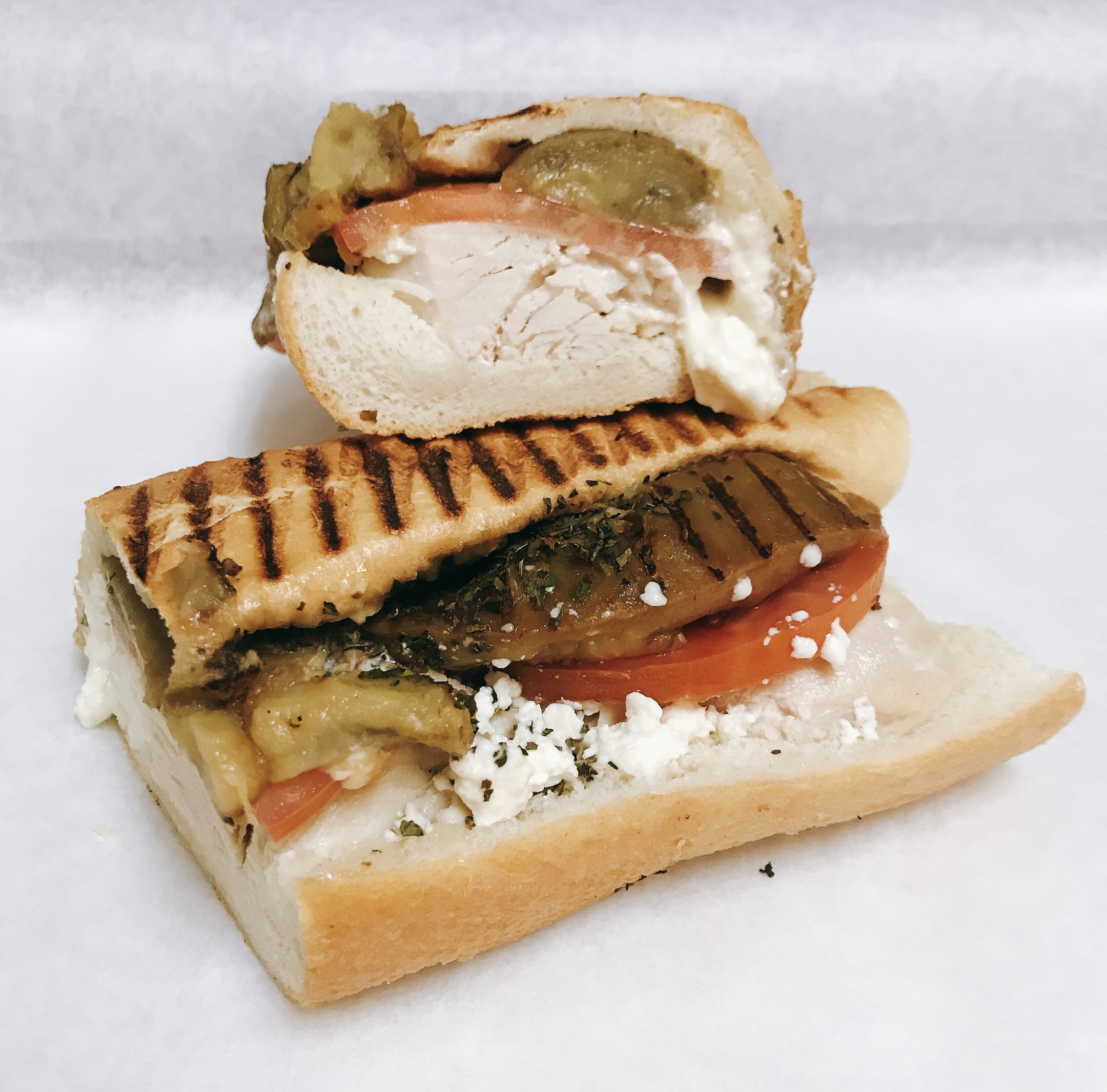 Order Hot Chicken Eggplant Sandwich food online from Le Diplomate Cafe store, Irvine on bringmethat.com