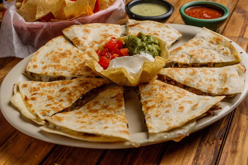 Order Quesadillas (Large0 food online from Cilantros Mexican Restaurant store, Houston on bringmethat.com