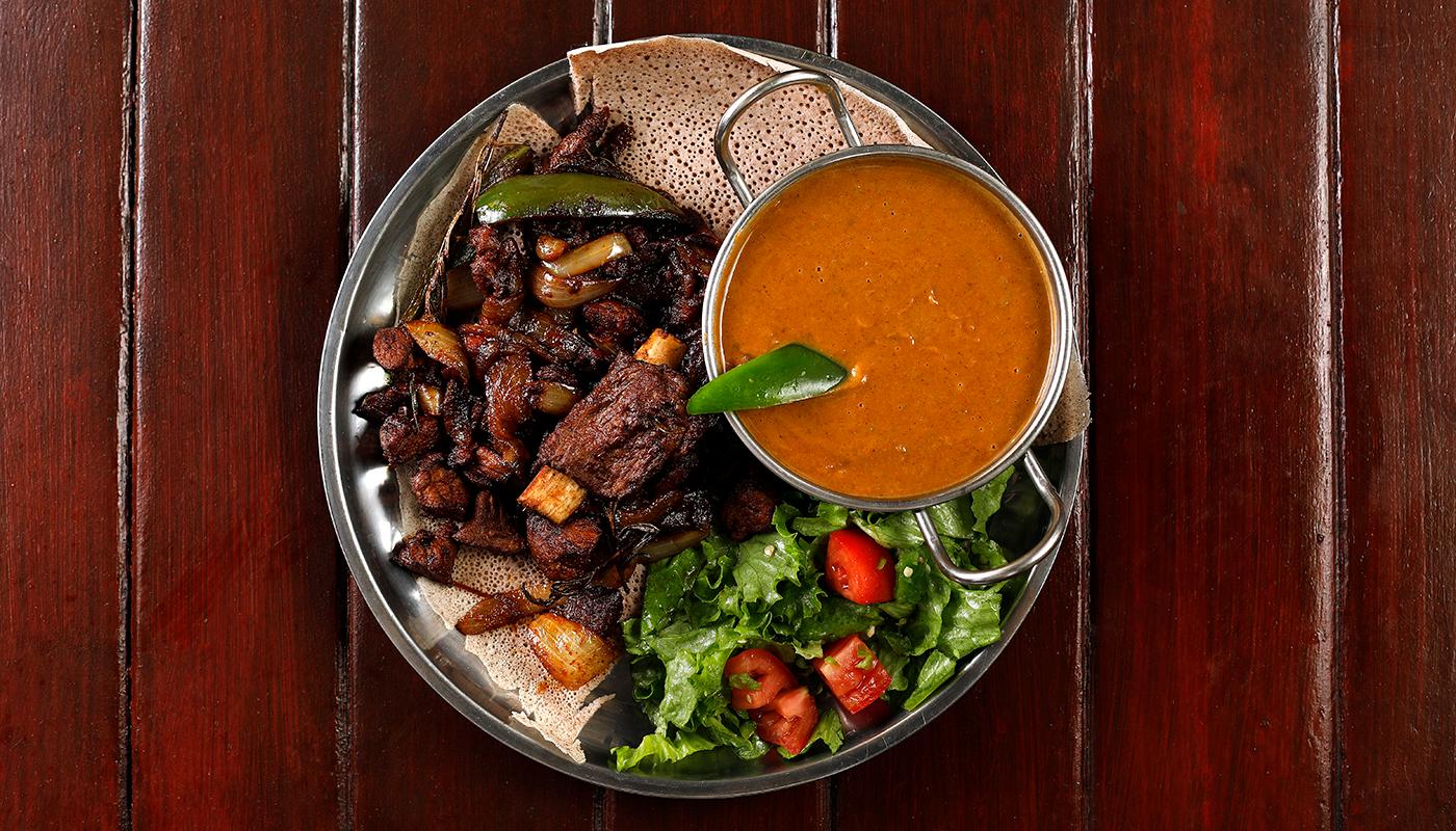Order Begue Tibs (Lamb) food online from Cafe Colucci store, Oakland on bringmethat.com