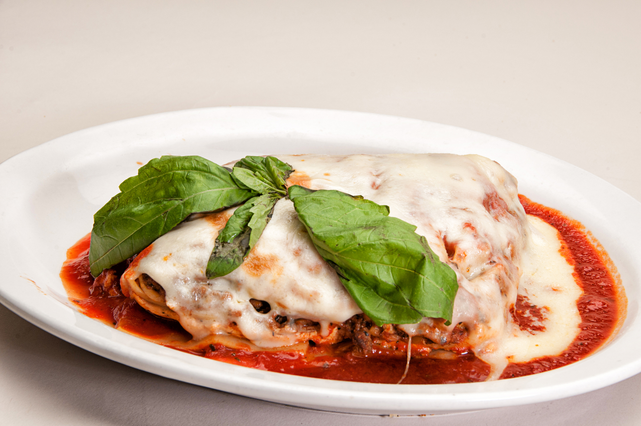 Order Lasagna Rolendine Entree food online from Barraco's Pizza store, Evergreen Park on bringmethat.com