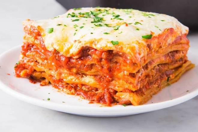 Order Homemade Meat Lasagna food online from Tony's Pizza store, Whittier on bringmethat.com