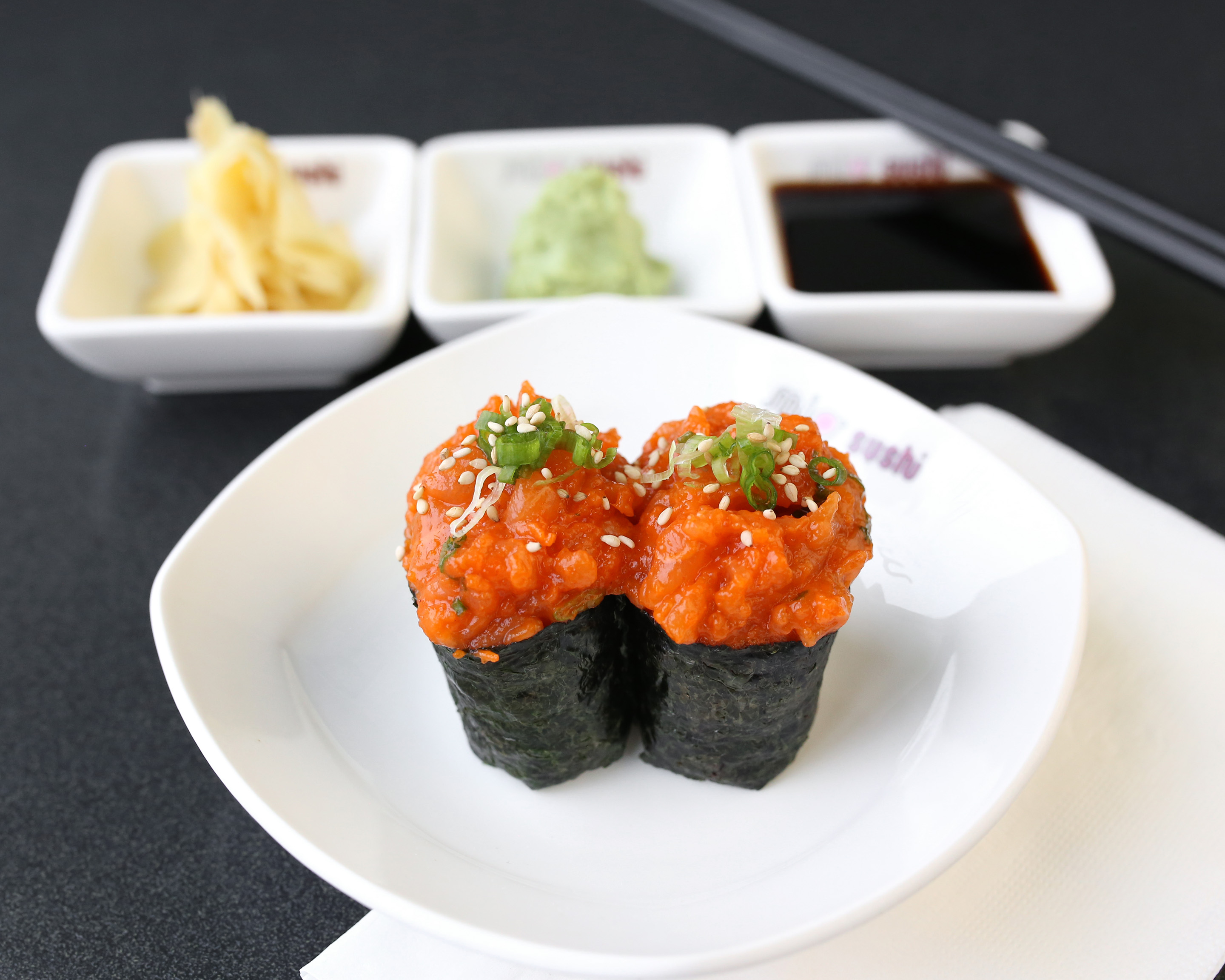 Order Spicy Salmon Nigiri food online from Mio Sushi store, Beaverton on bringmethat.com
