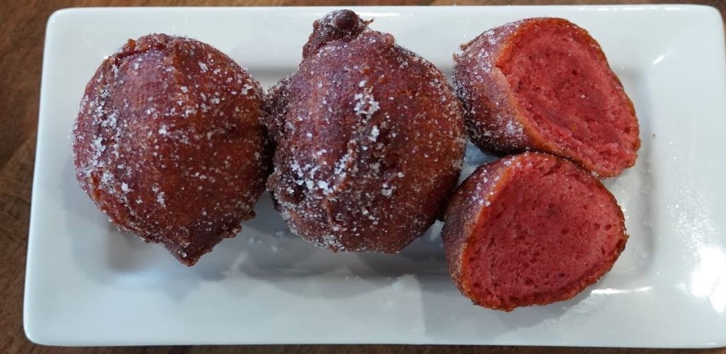 Order Red Velvet Puff Puff food online from Fusion Vibes Kitchen + Bar store, Richardson on bringmethat.com