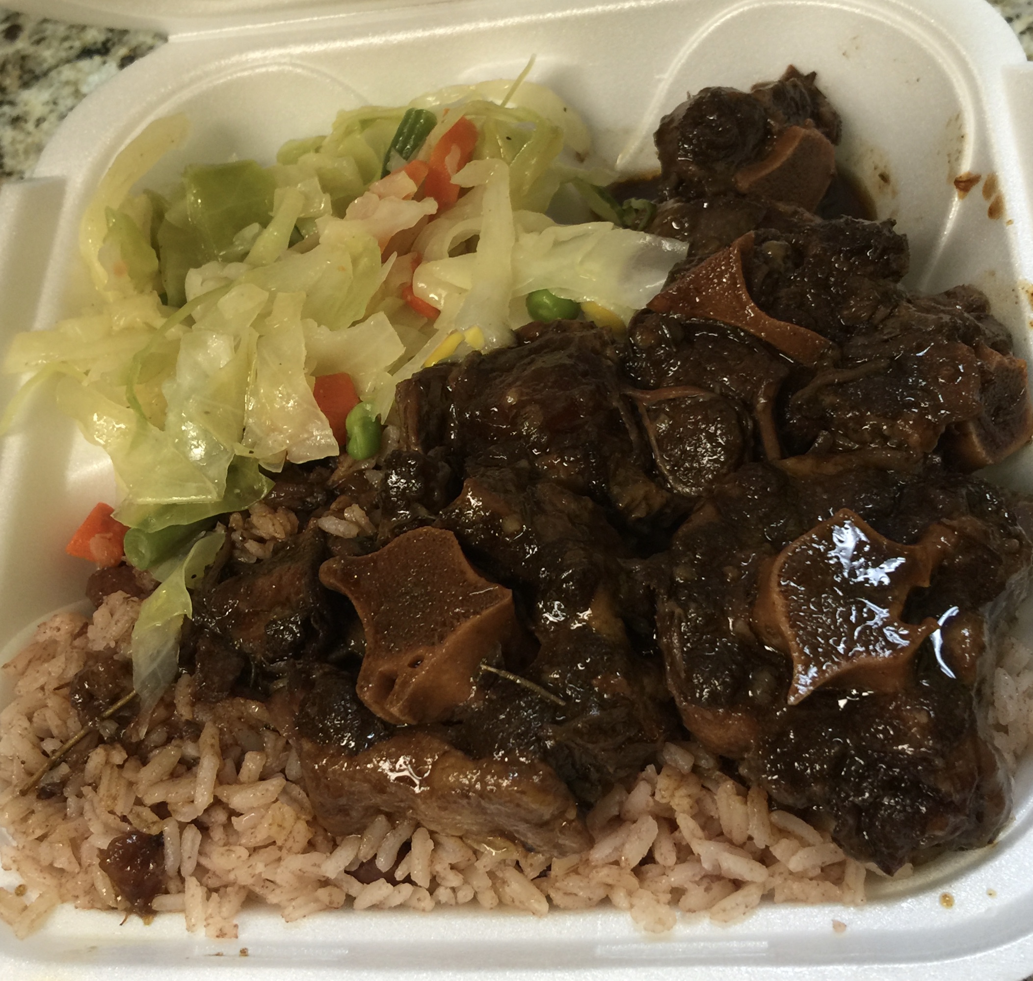 Order Oxtail food online from Mum's Jamaican Restaurant store, Raleigh on bringmethat.com