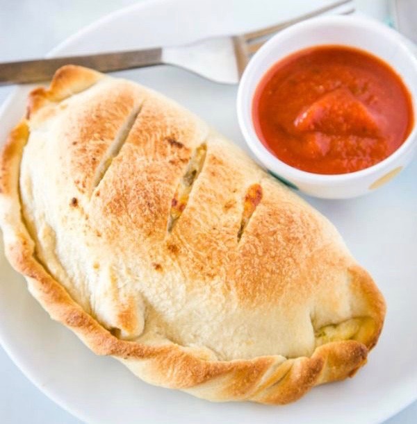Order 1 topping Calzone Specialty food online from Amici Pizza & Pasta store, Tannersville on bringmethat.com
